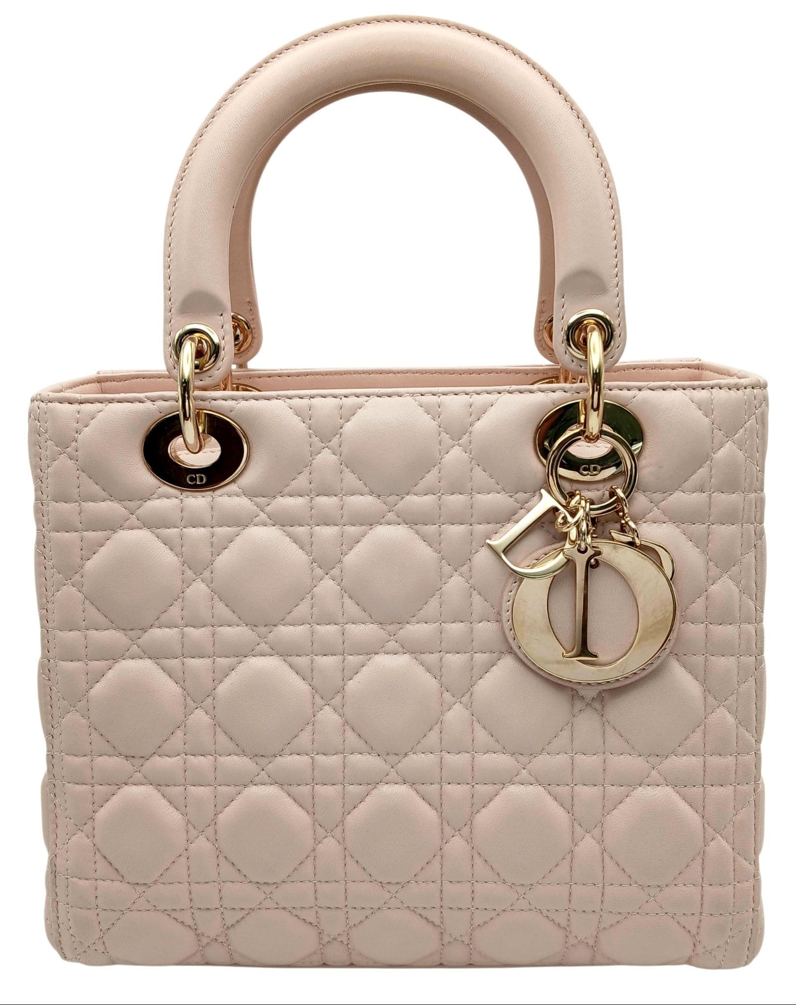 A Christian Dior Blush Pink Cannage Quilted Leather Lady Dior Handbag.