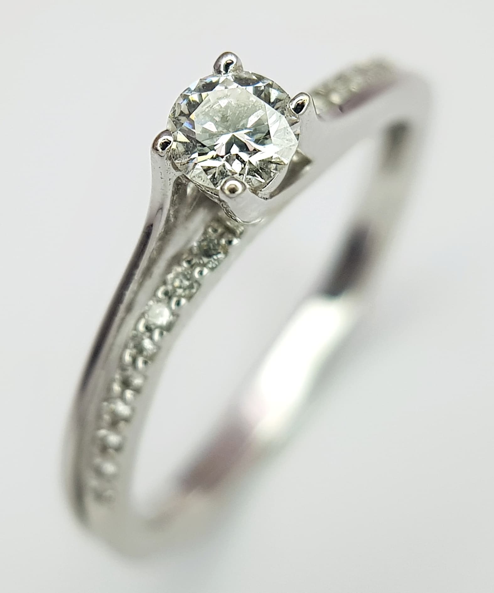 An 18K White Gold Diamond Ring.