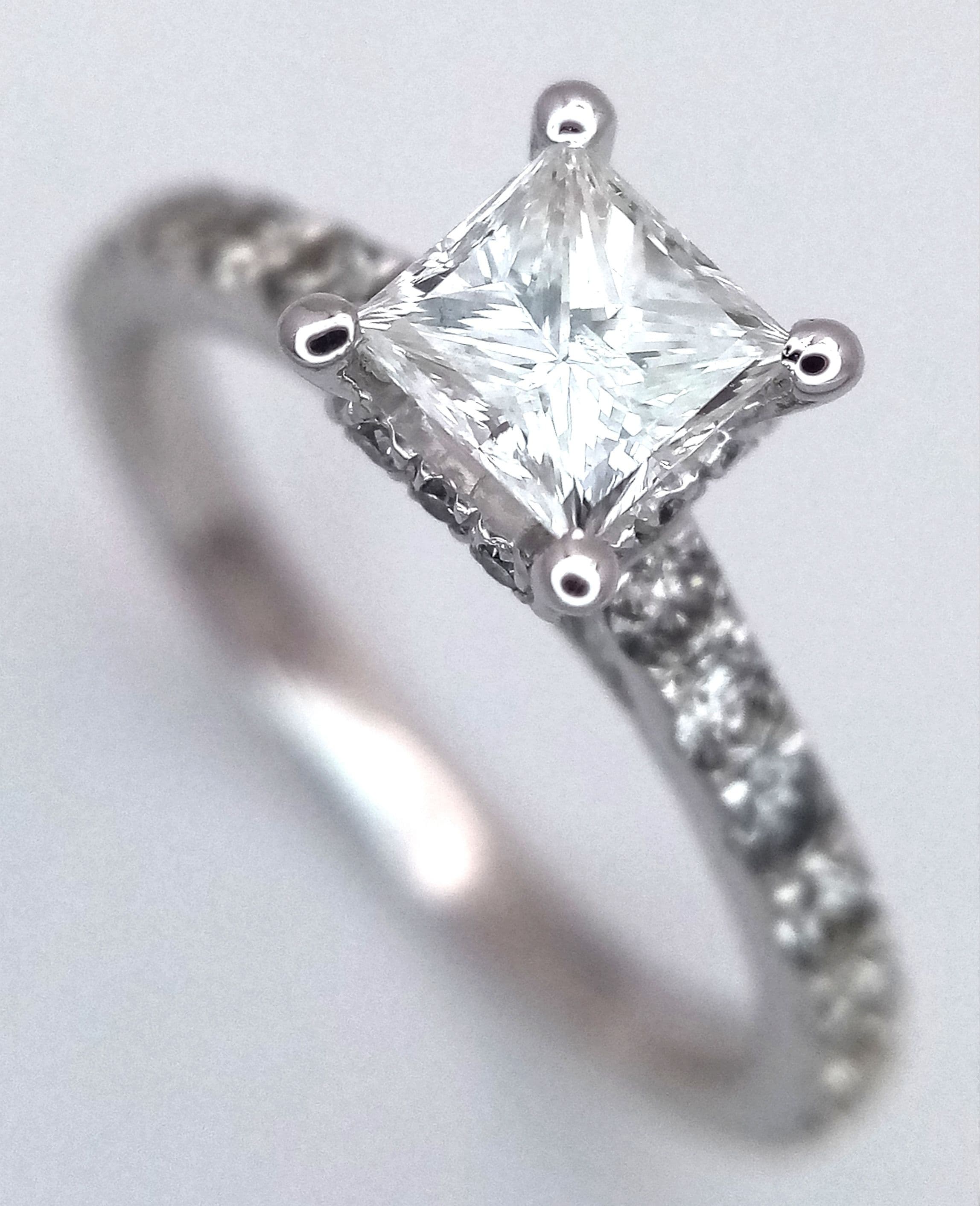 An 18K White Gold, Platinum and Diamond Ring.