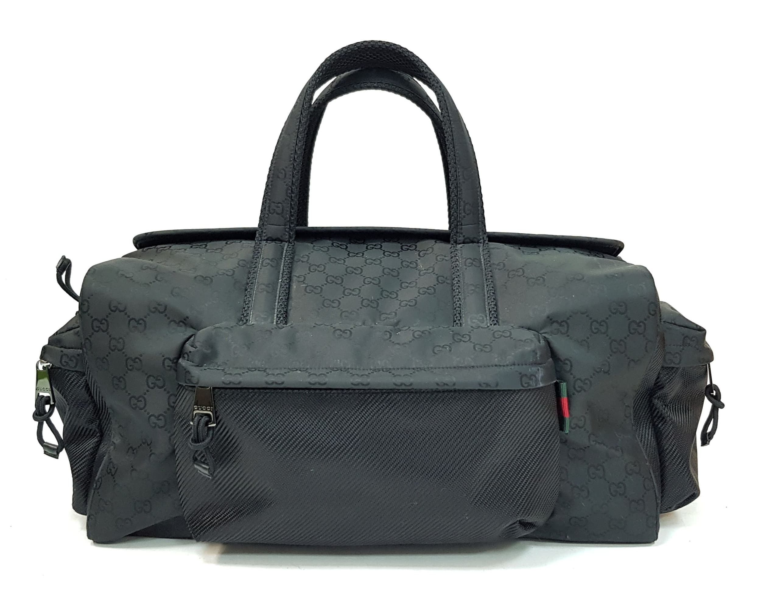 A Gucci Black GG Monogram Nylon Duffle Bag.