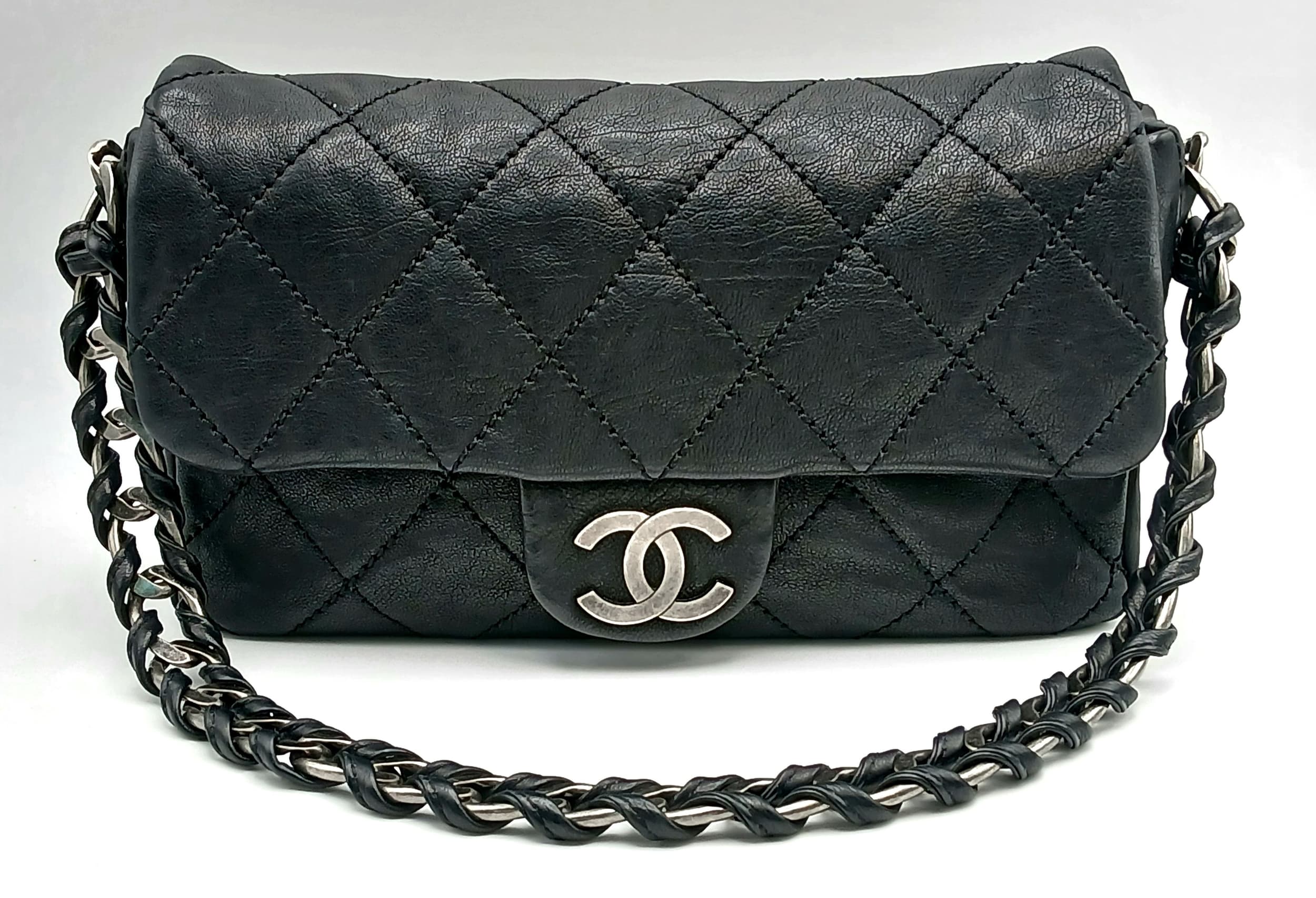 A Chanel Glazed Caviar Quilted Medium Modern Chain Flap Bag.