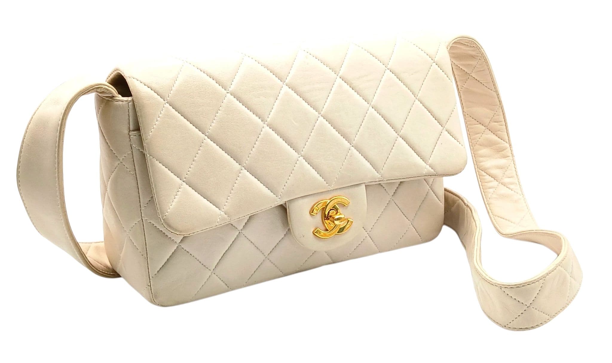 A Chanel Cream Quilted Lambskin Single Flap Shoulder Bag.