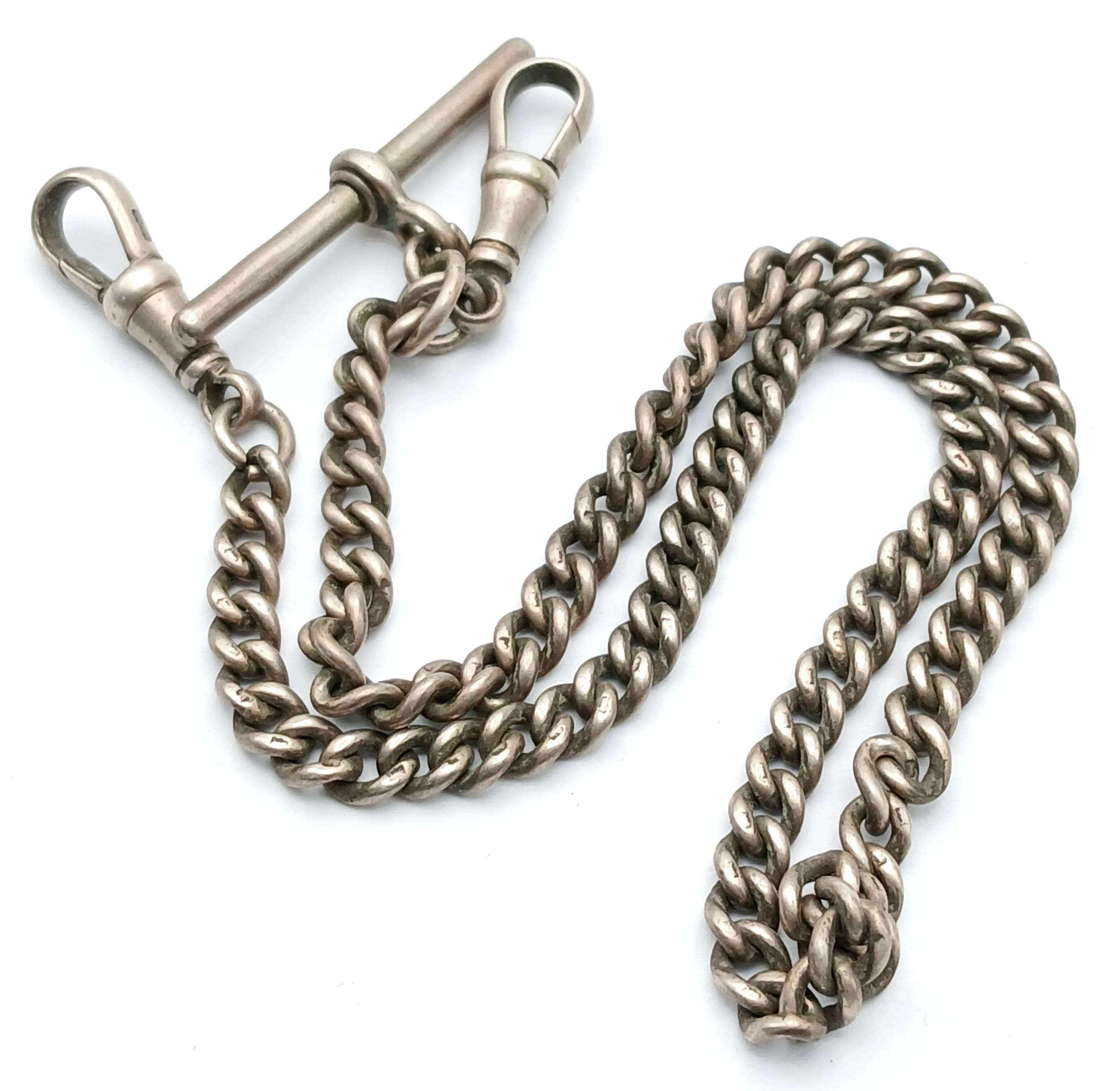 An Antique Sterling Silver Albert Watch Chain. T-bar and two lobster clasps. 34cm. 28.23g.