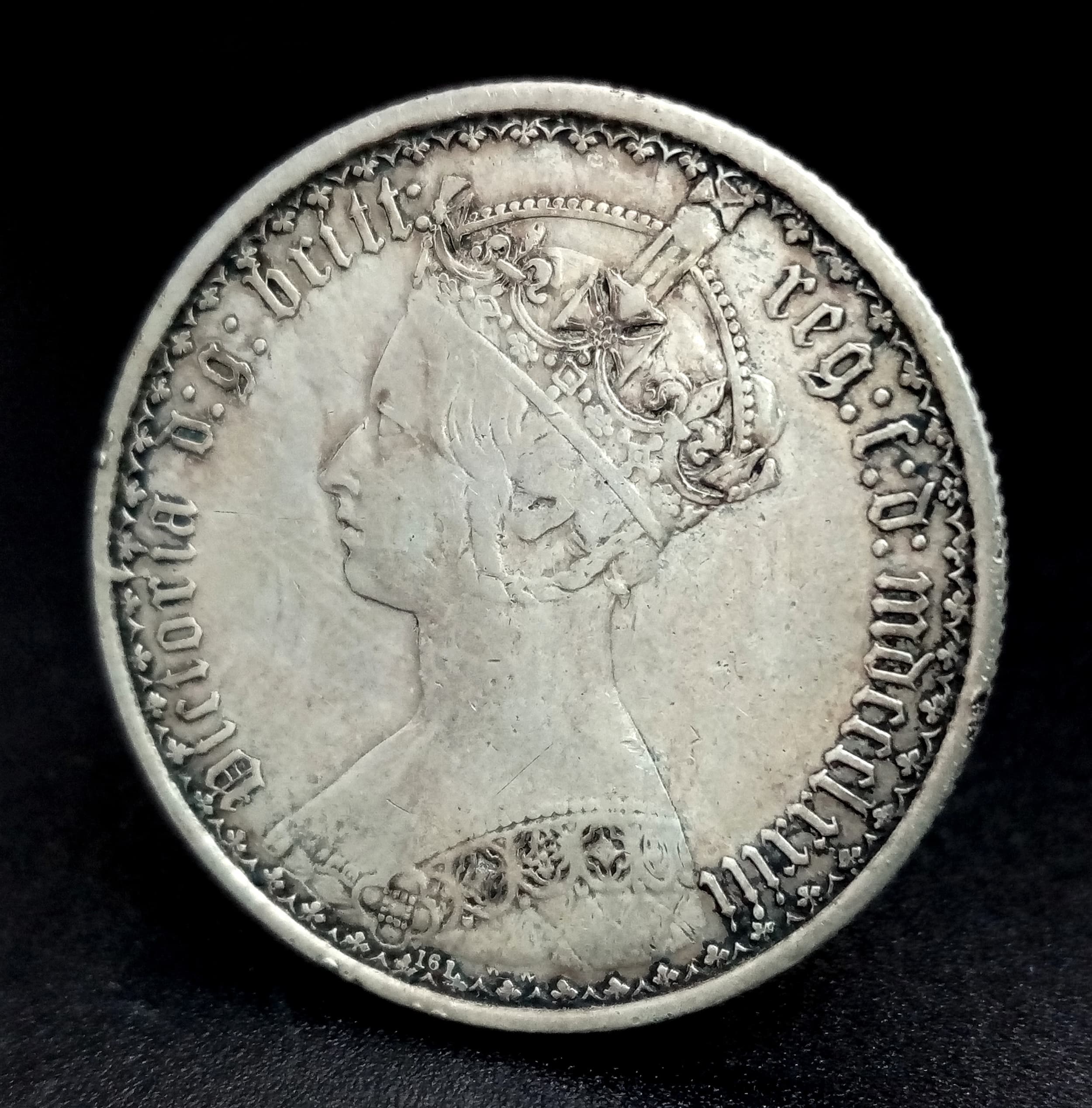 A Very Fine Condition 1873 Queen Victoria Gothic Silver Florin coin. Graded on the Sheldon Scale. Weight 11.25 grams.