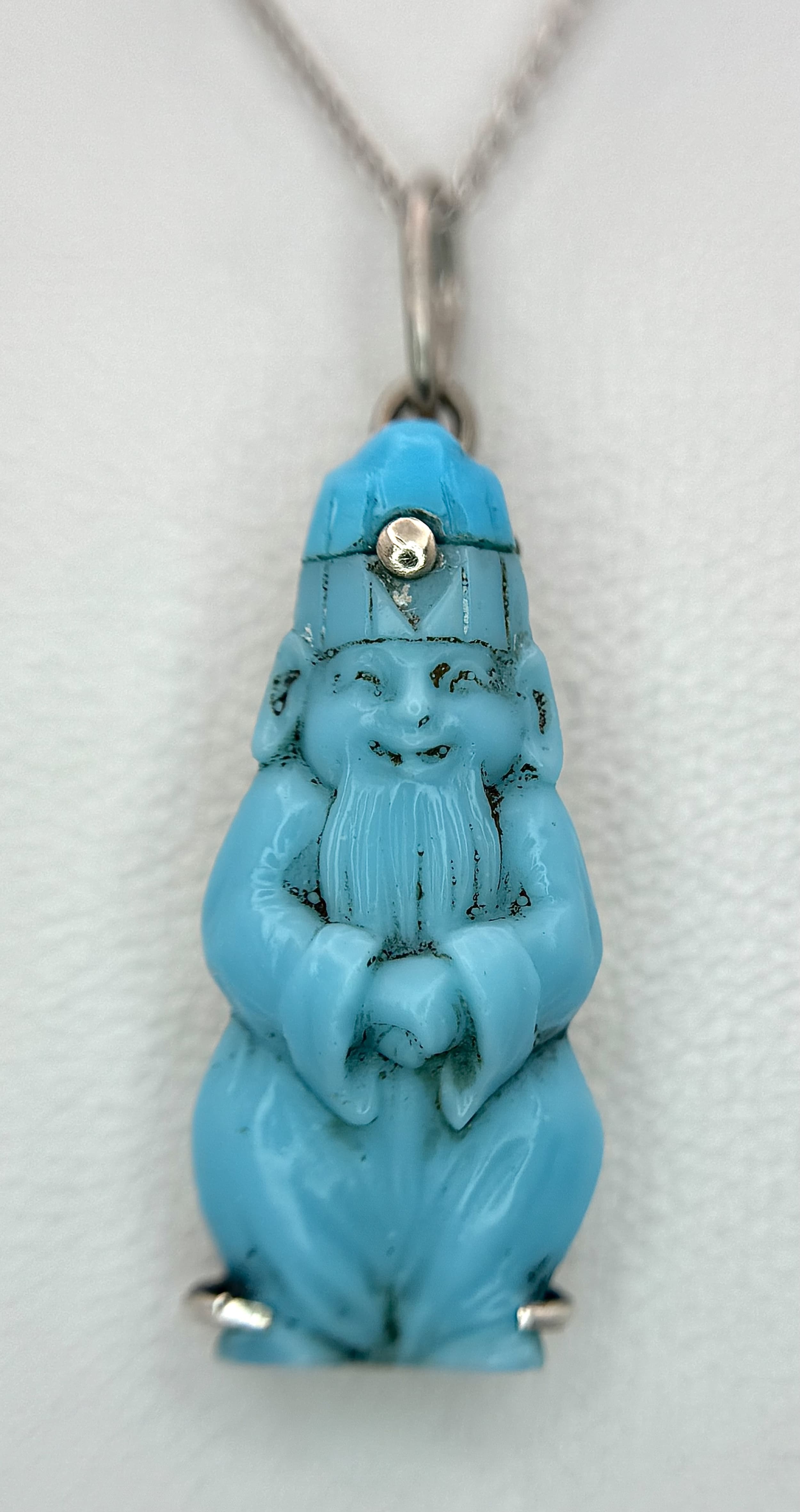 A Turquoise Happy Buddha Pendant on an 18K White Gold Chain Necklace. Necklace Hallmarked 750 and Weighs 1.34 Grams. Ref: 3-5