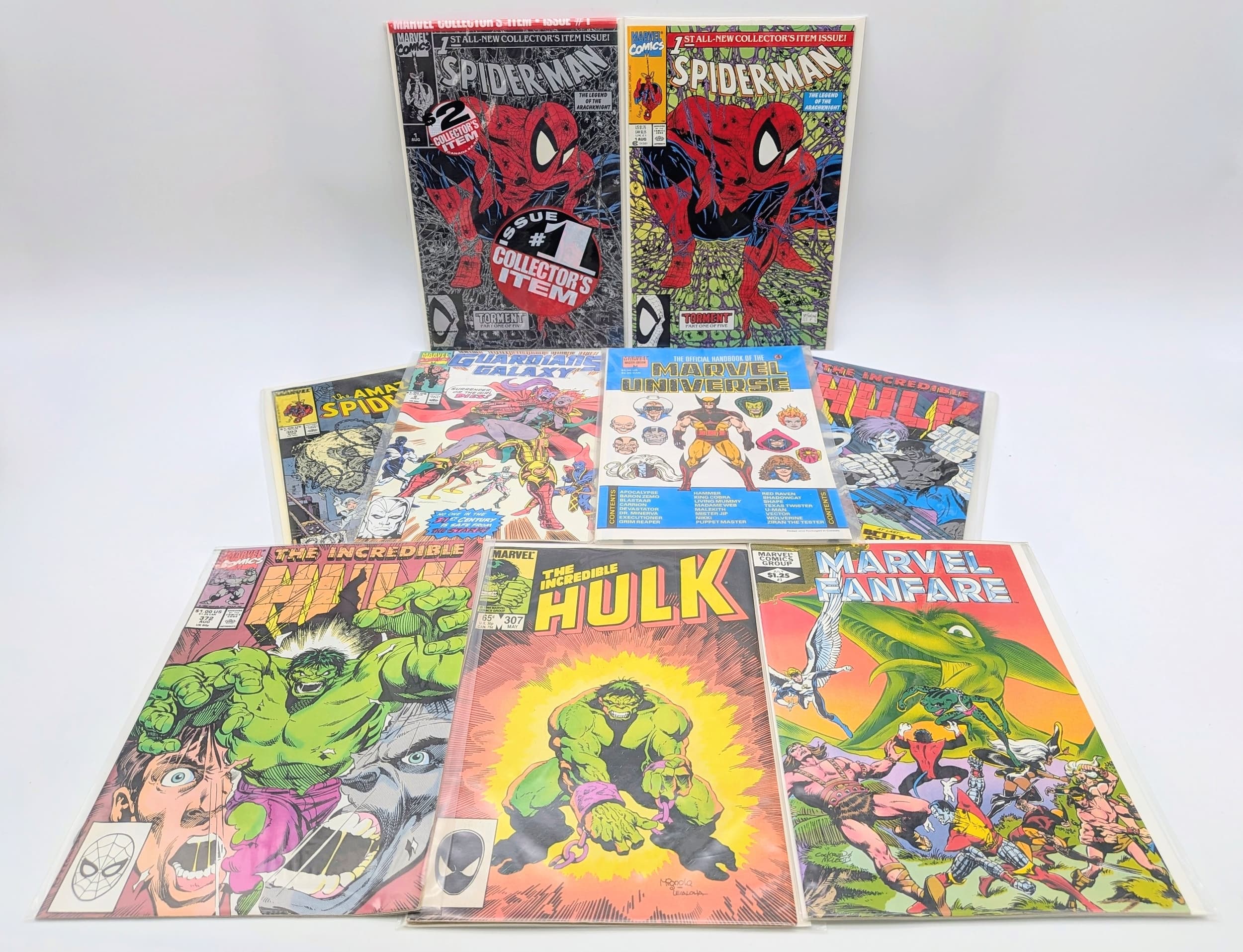 Ten Mixed Marvel Comics - All plastic wrapped. Please refer to photos for finer details.