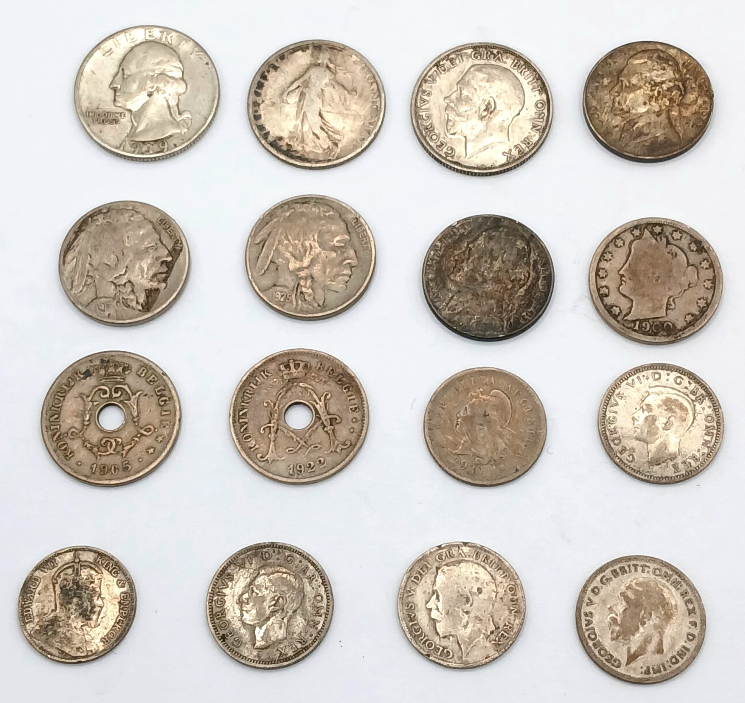 A Parcel of Sixteen Vintage and Antique Silver World Coins Comprising: 1) A Very Fine Condition 1922 Belgium 10 Centimes-Legend in Dutch, 2) A Fine Condition 1898 French 1 Franc, 3) A Very Good Condition Argentine 10 Cent, 4) A Very Fine Condition 1917 USA Buffalo Nickel, 5) A Fine Condition 1903Hong Kong 10 Cent, 6) A Very Fine Condition 1905 Belgium 10 Cent-Legend inDutch, 7) An Extremely Fine Condition 1943-P USA Jefferson Nickel, 8) A FineCondition WW2 1942 dated British Six Pence, 9) A Very Fine Condition WW21945 dated British Six Pence, 10) A Very Fine Condition WW2 1939 DatedUSA Washington Quarter, 11) A Good Condition 1900 USA Liberty Nickel-withCents, 12) A Very Fine Condition WW1 1917 Dated British Shilling, 13) A VeryFine Condition WW2 1943 dated USA Jefferson Nickel, 14) A Fine ConditionWW1 1916 Dated British Six Pence, 15) A Fine Condition 1933 British SixPence & 16) A Very Fine Condition 1925 USA Buffalo Nickel. All graded on theSheldon Scale. Gross weight 65.85 Grams.