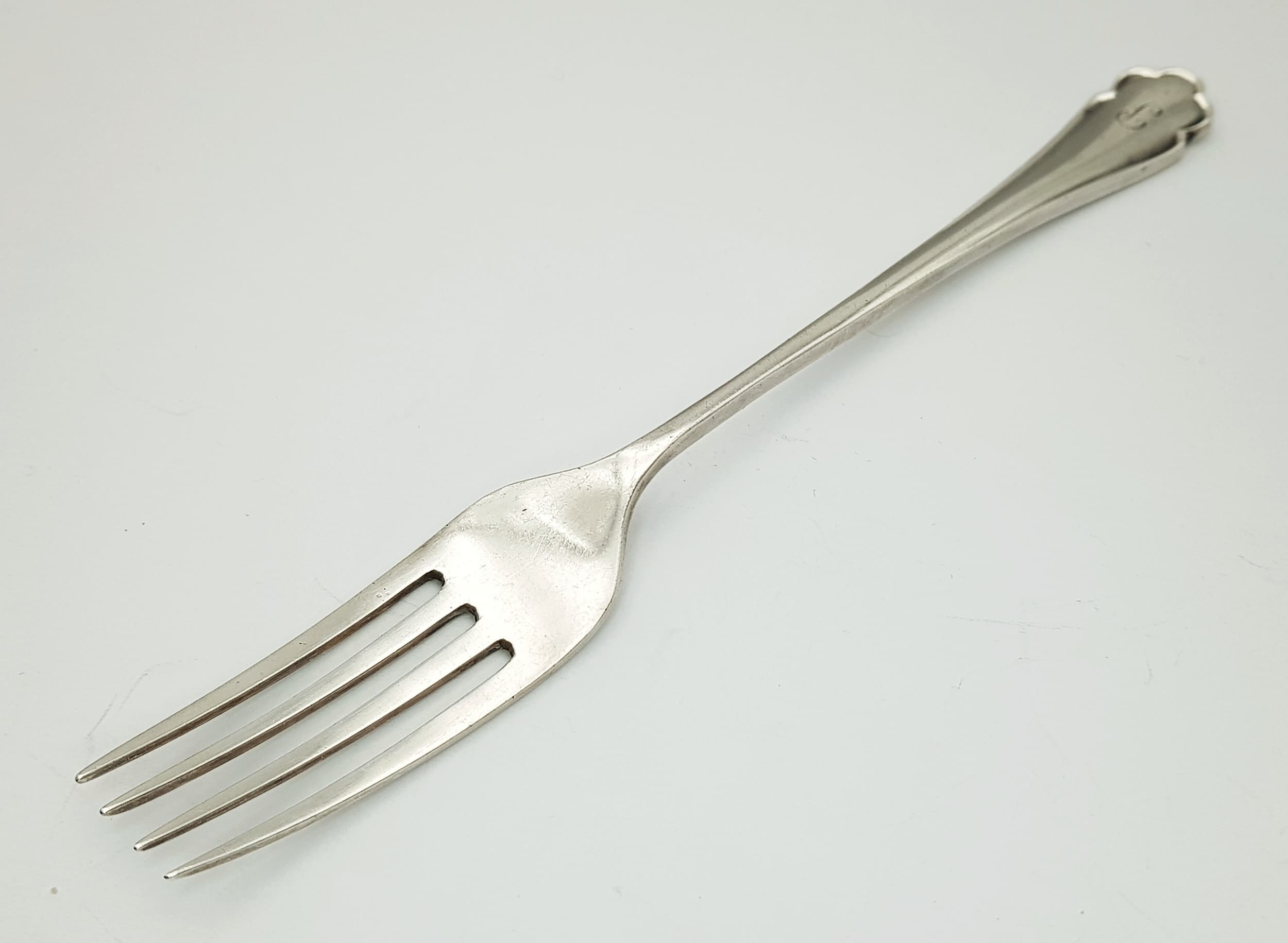 A vintage sterling silver fork. Full Sheffield hallmarks, 1937. Total weight 22.3G. Total length 15cm.