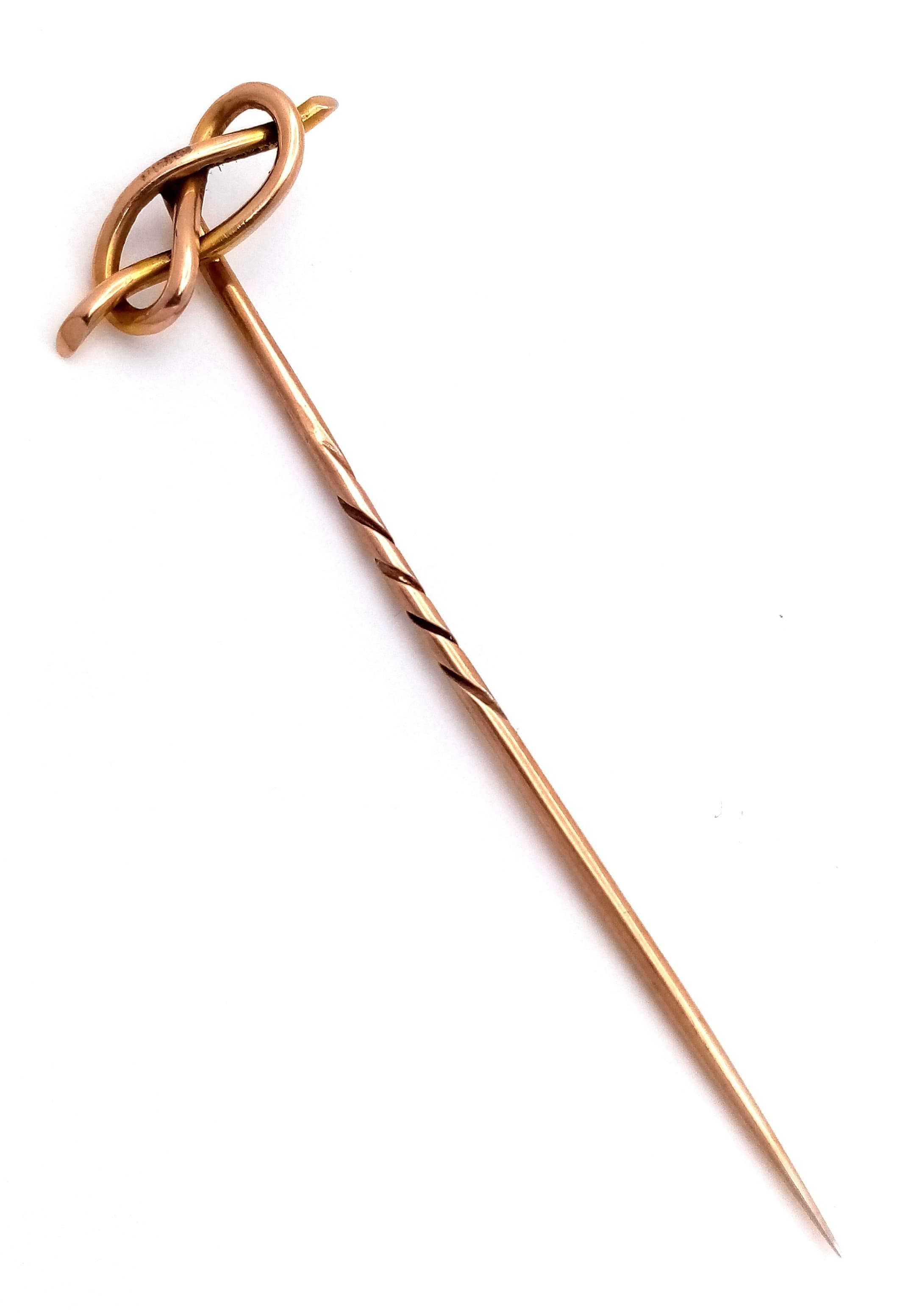 An Antique Gold (tests as 9K) Stickpin with Knot Finial. Comes with fitted case. 5.5cm. 1.6g.