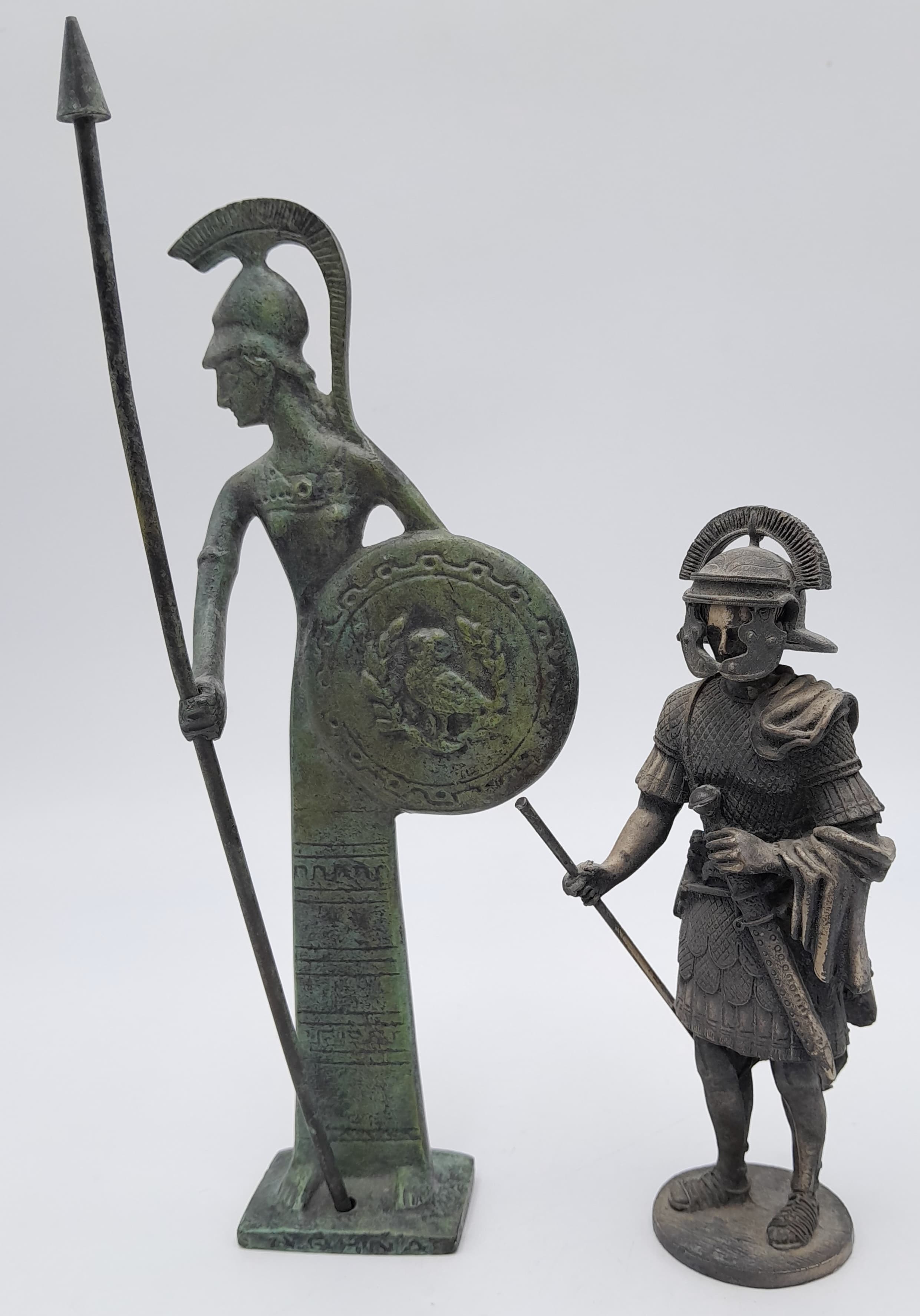Two Vintage Cast Metal and Bronze Statuettes of a Roman Centurion and the Greek Goddess ‘Athena’. The Very Detailed CenturionFigure measures 13cm tall and weighs 475 grams and the Athena medal is21cm Tall and weighs 334 grams.
