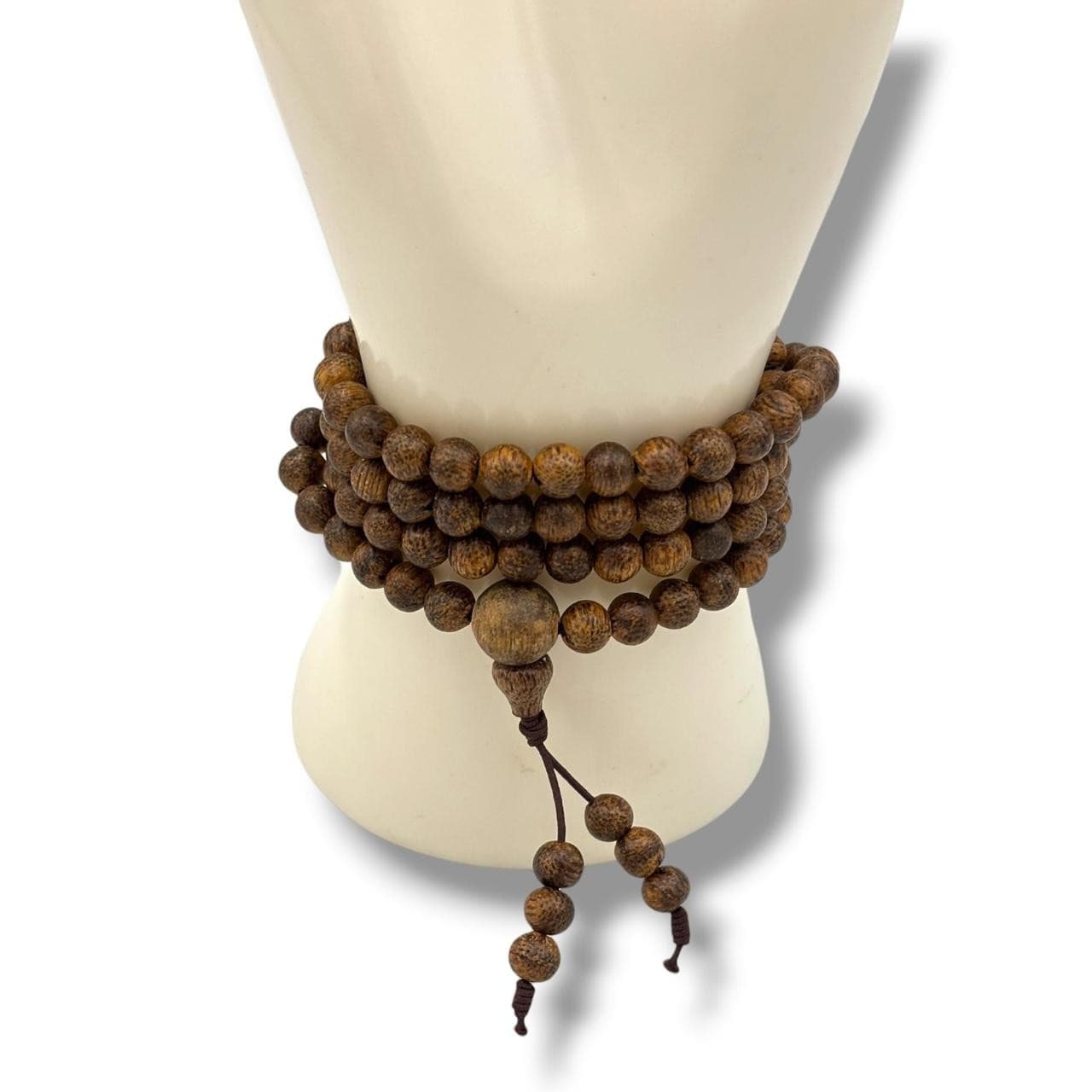 A natural Agarwood 108 beads mala prayer Chain, can be worn as Necklace or multi-strand bracelet. The natural agarwood fragrance is well known for its purposes in relaxation and meditation. Natural surface variation throughout - please see photos for condition. Approximately 31cm length. Please see photos or request a condition report. This item is held at Cadmore ASIAN Office in Vietnam and will be shipped from there. Buyers will be responsible for direct shipping payments. Delivery will take slightly longer.