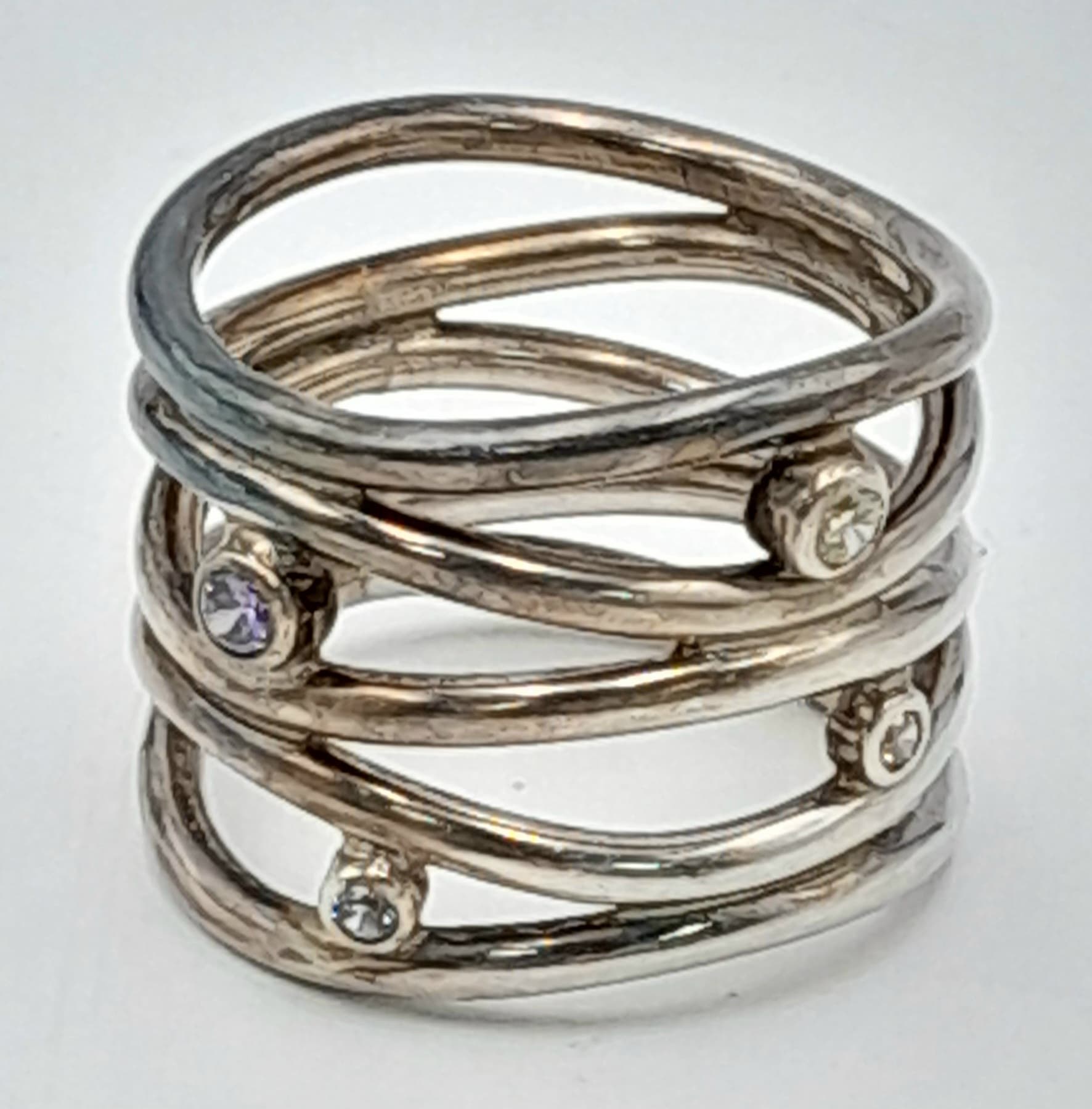 A lovely vintage 925 silver stone set spring design ring. Total weight 11.6G. Size R