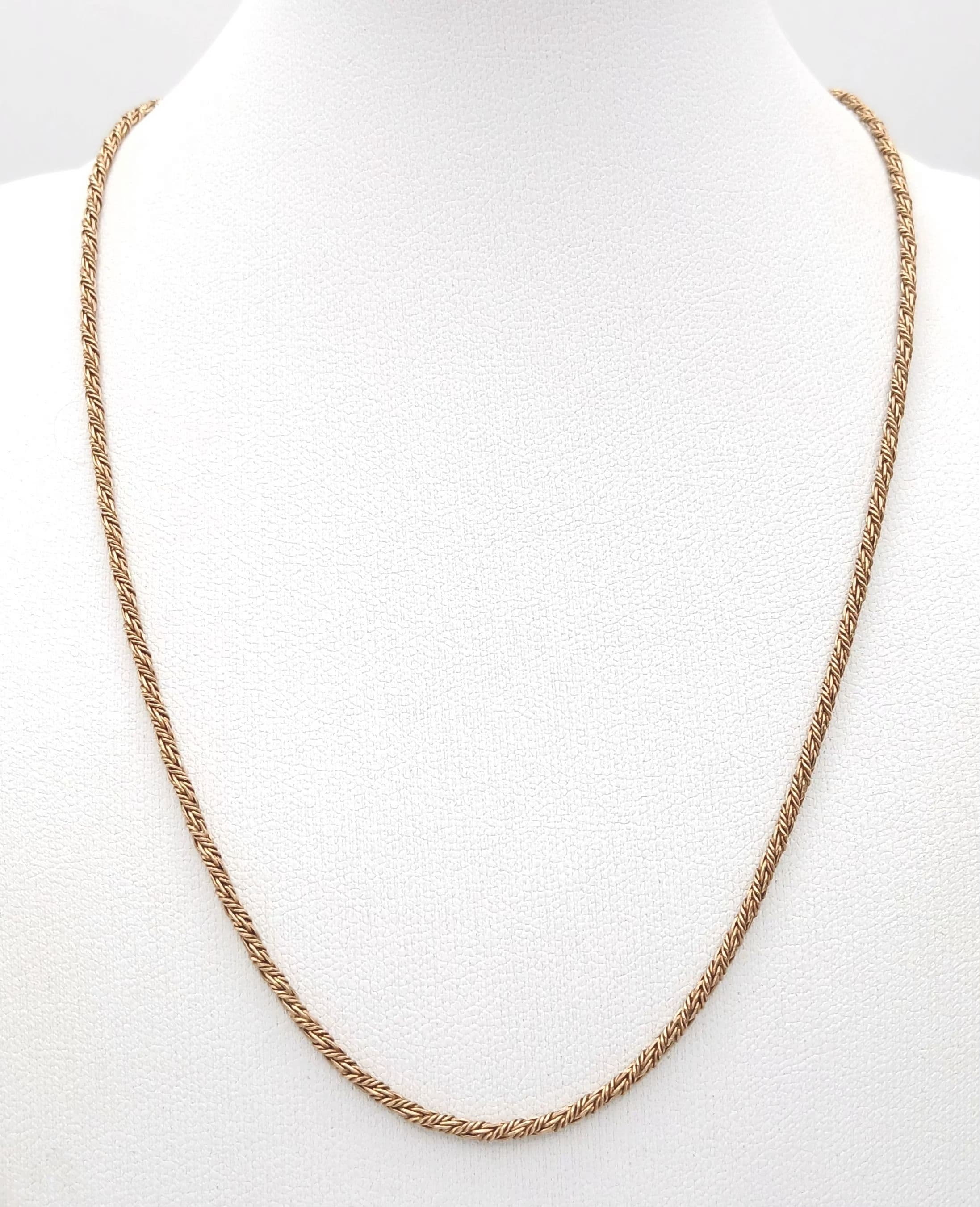 A 9K GOLD SNAKE TWIST NECKLACE CHAIN . 4.8gms 38cms