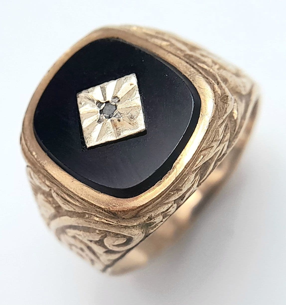 Fabulous Vintage 9 CARAT GOLD and BLACK ONYX RING . Having Diamond Point Centre. Beautifully Decorated Shoulders and Mount. 5.0 Grams. Size N. Stunning Ring , Please see pictures.