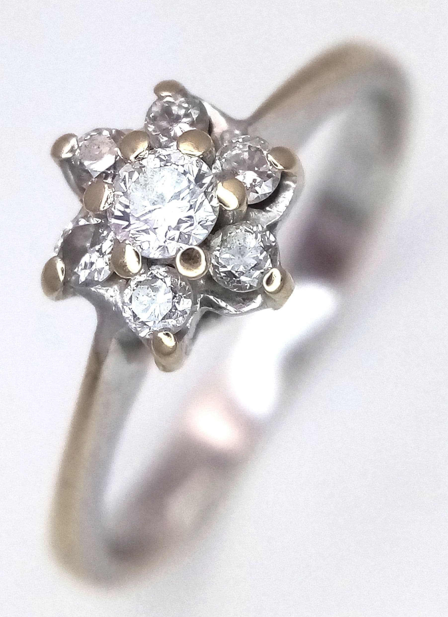 18k white gold diamond cluster flower ring, 0.15ct diamond weight, ring size I, 1.8g total weight