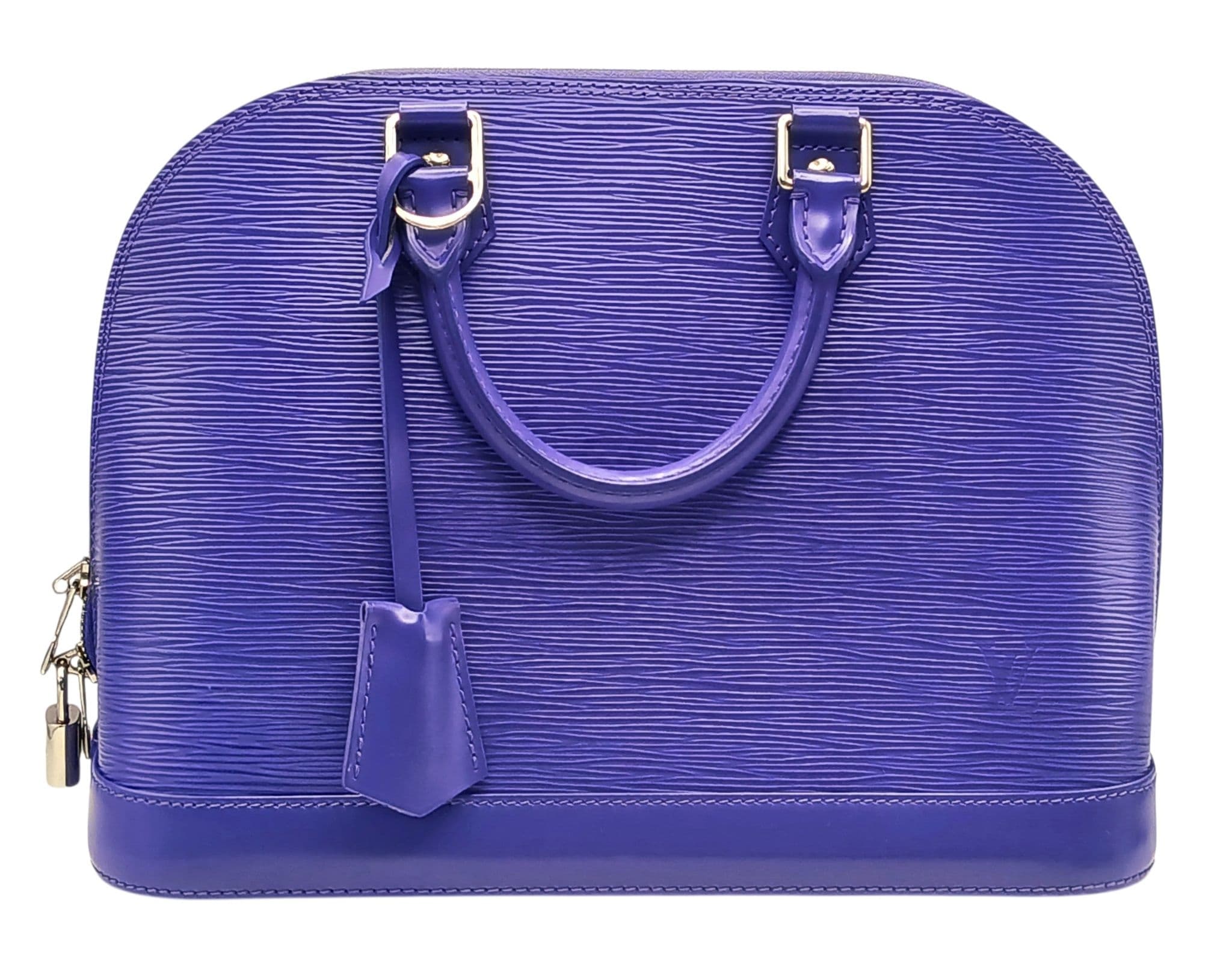 A Louis Vuitton Purple Electric Epi Leather Alma PM Handbag. Purple textured patent Epi leather exterior with silver-toned hardware, dual rolled top handles, clochette, padlock, keys, protected base studs and zipped top closure. Purple textile interior with one main compartment and open side pockets. Approx 30cm length x 23cm height x 13cm depth. Comes with a detachable shoulder strap, certificate of authenticity and dust cover. Few tiny marks to the leather and scratches to the hardware but in very good condition overall. Please see photos or request a condition report. Ref: 28647.