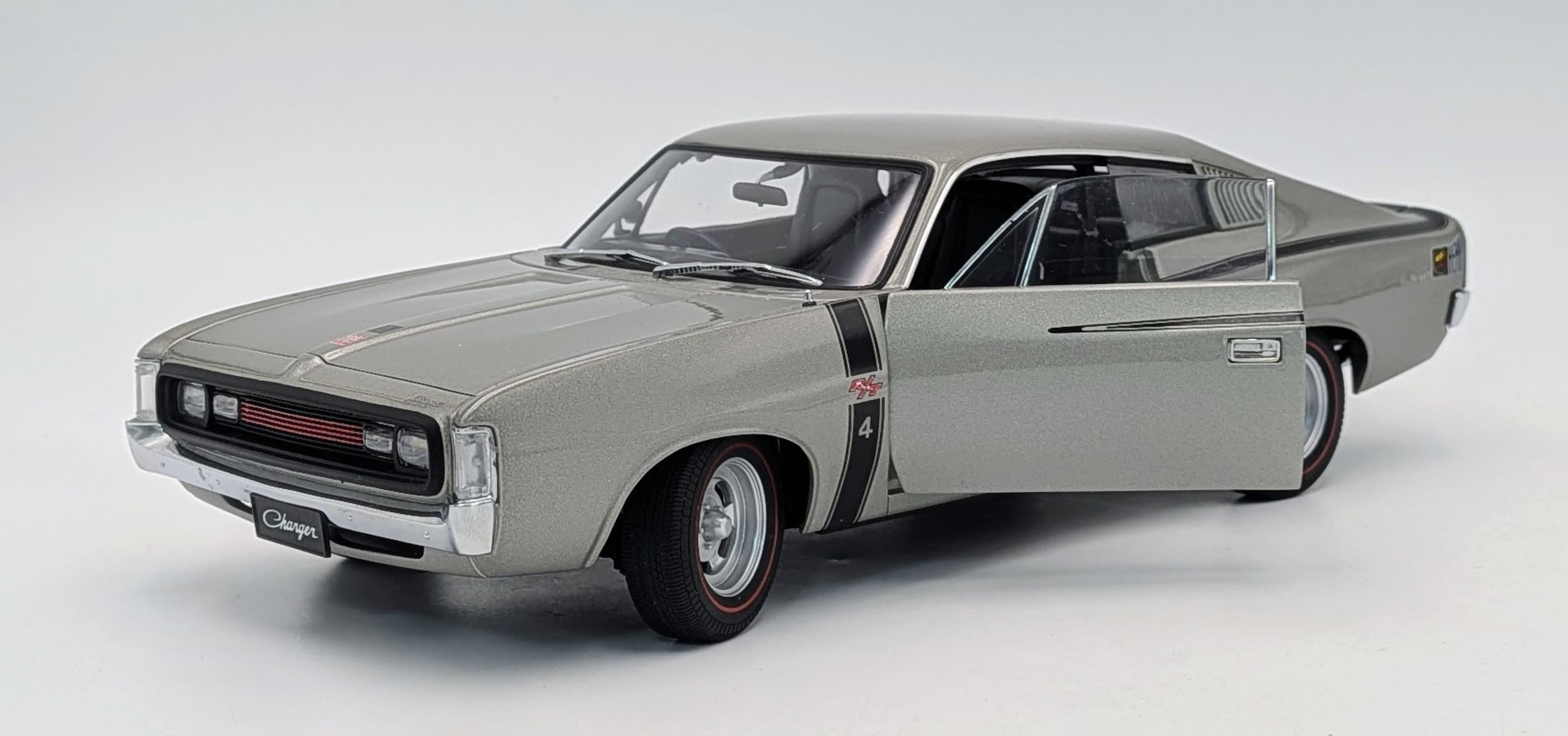 An Autoart, Chrysler Charger E49 diecast model car. 1/18th scale. In very good condition. Box has discoloured a bit from storage.