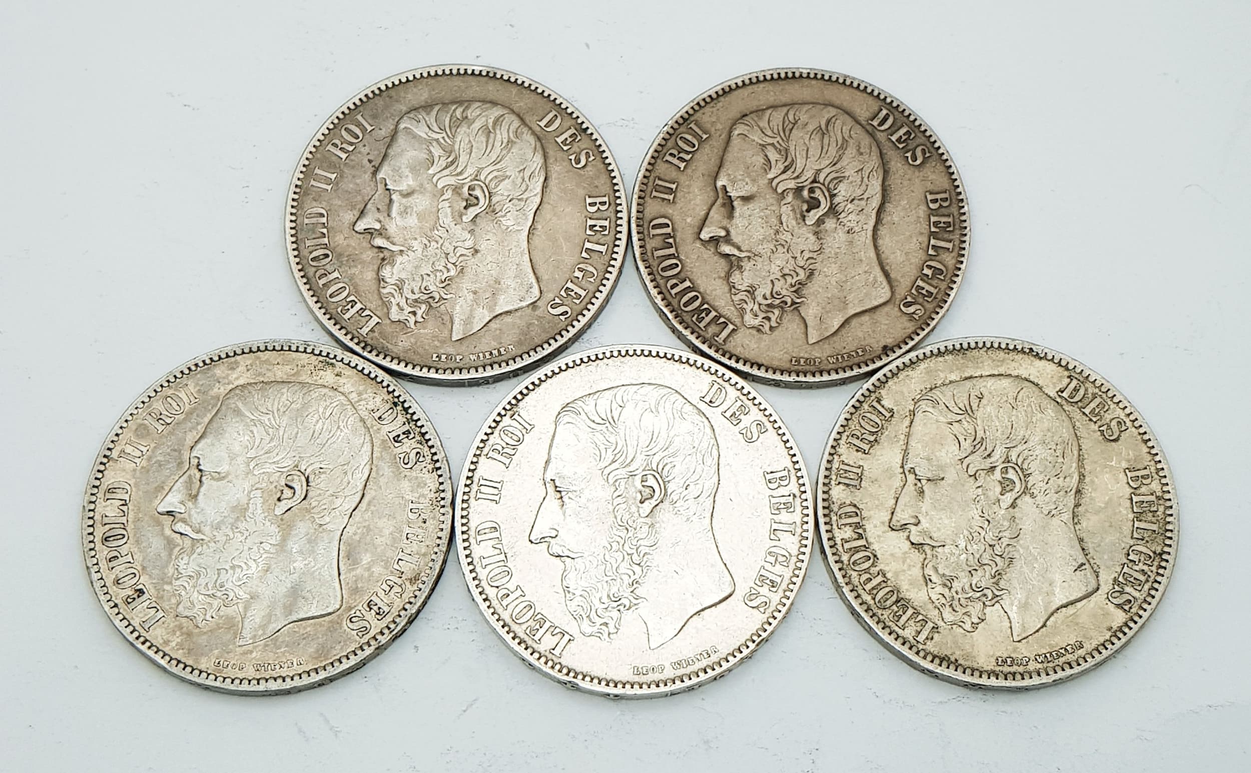 Five Antique Belgium Leopold II, 5 Franc Silver (900 purity) Coins. 1867, 2 x 1868, 1873 and 1874. Please refer to photos for conditions. 124.4g total weight.