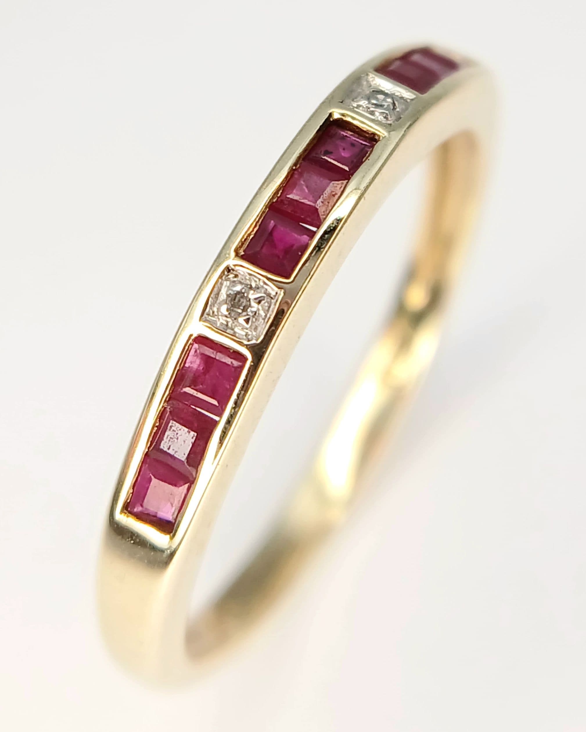 A 9K Yellow Gold, Diamond And Ruby Set Ring. 2.1G, Size P. Sc 3020