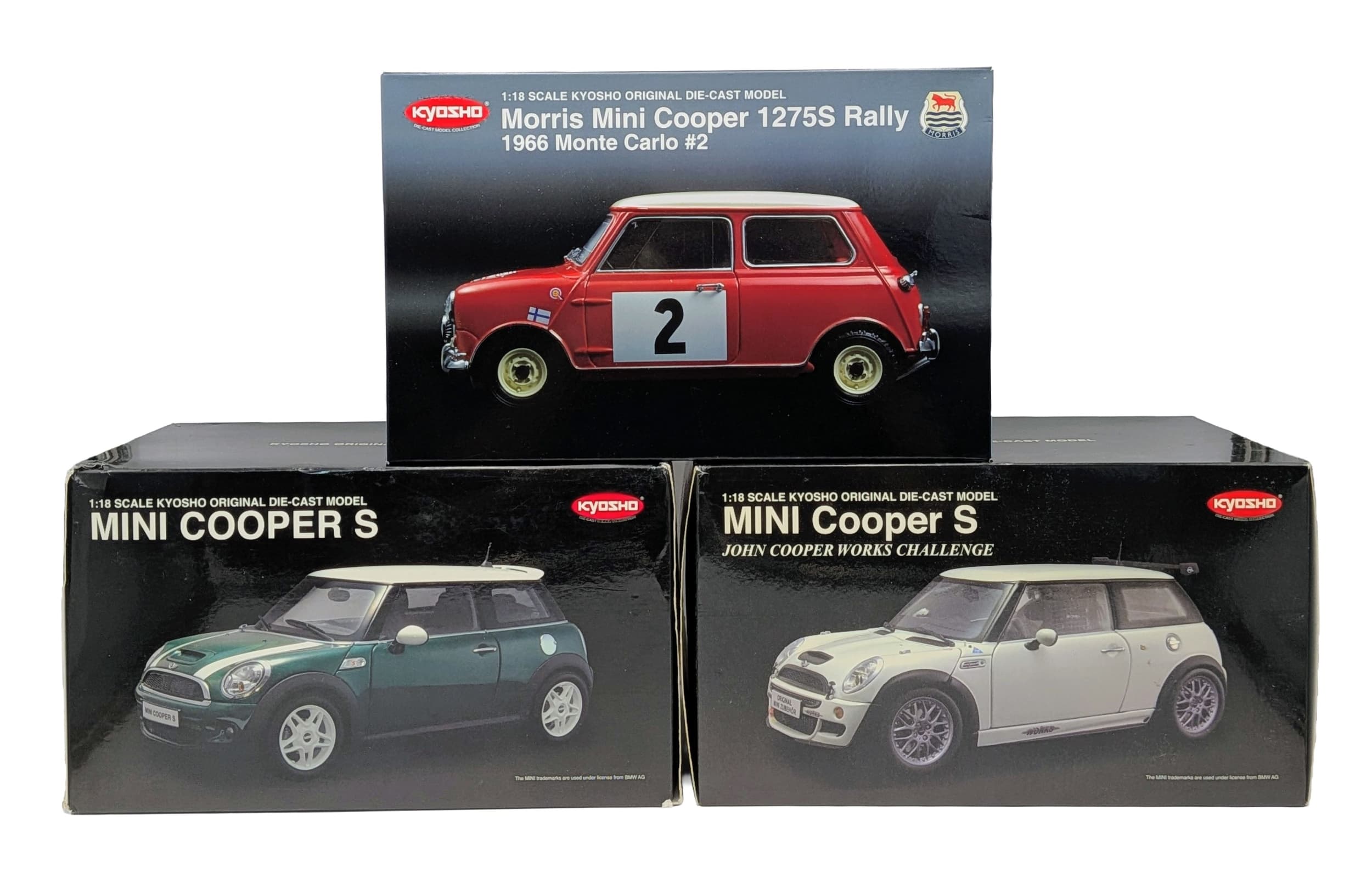 Three Kyosho diecast, 1/18th scale Mini;s. In original packaging. Very good condition. Slight wear to boxes from storage.