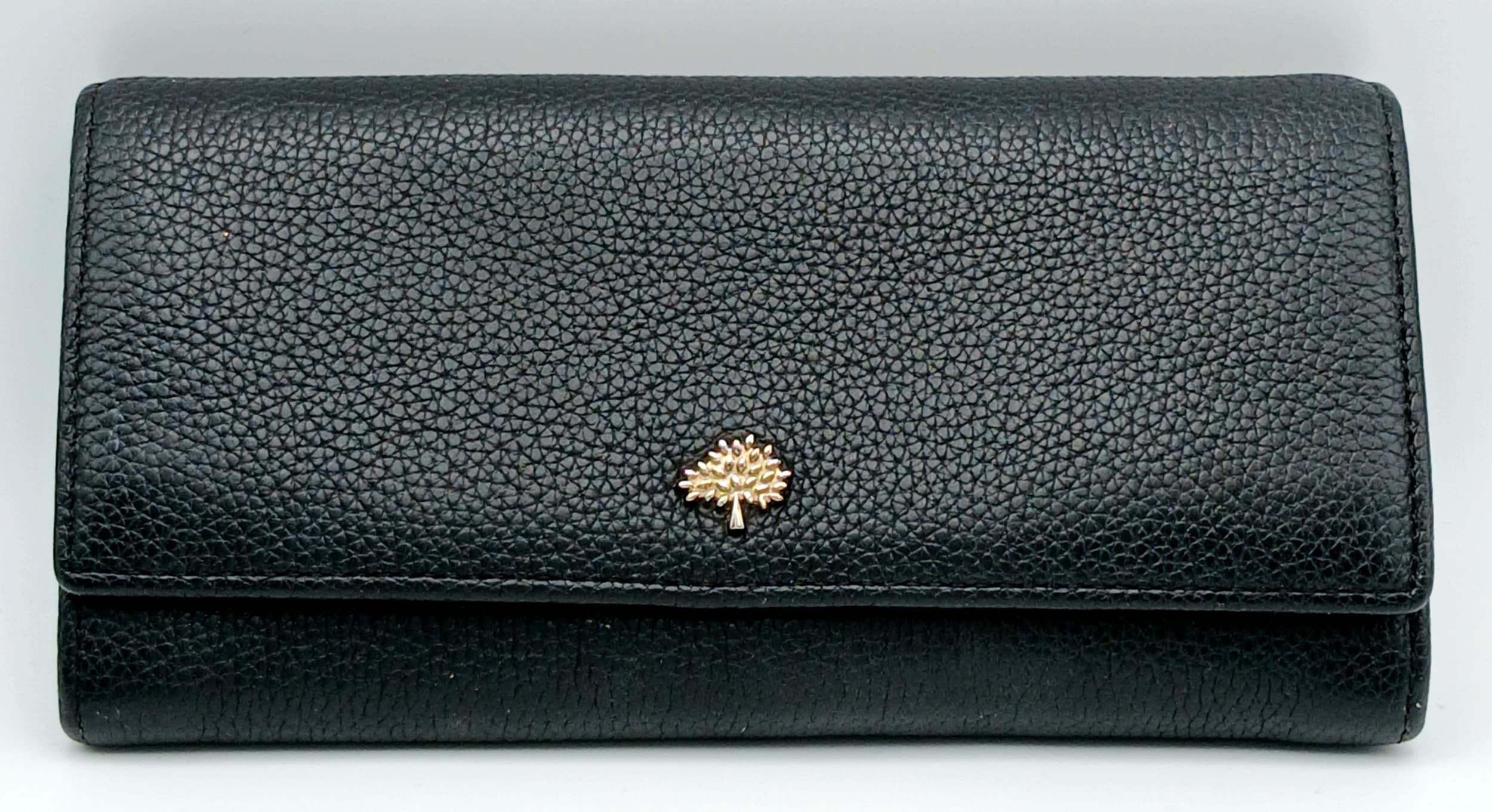 A Mulberry Black Leather Grain Purse/Wallet, approximately 19 x 10cm closed. Comes Boxed.