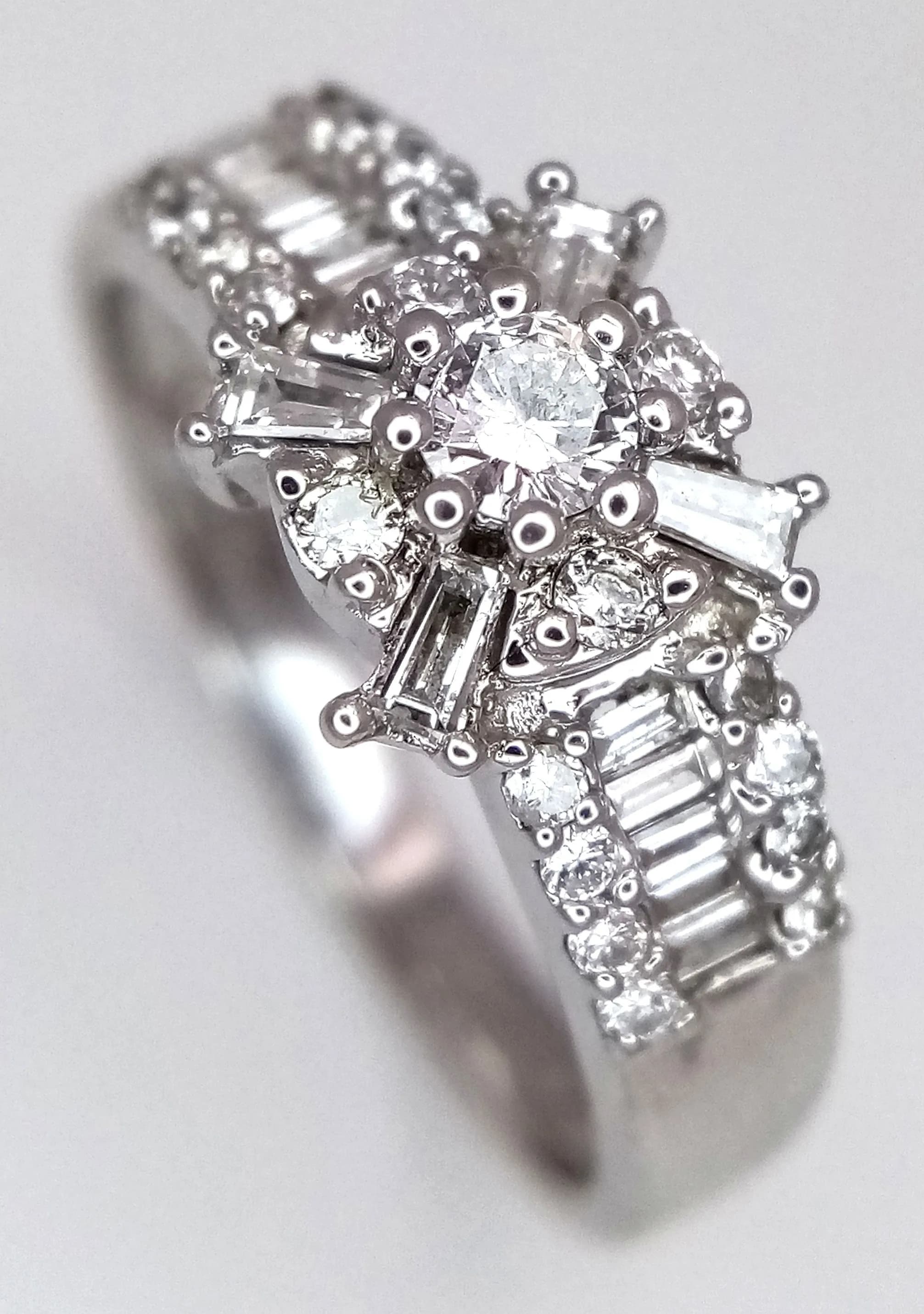 An 18K White Gold, Mixed Cut, Diamond Set Ring. 3.9G, Size O. Sc 4073