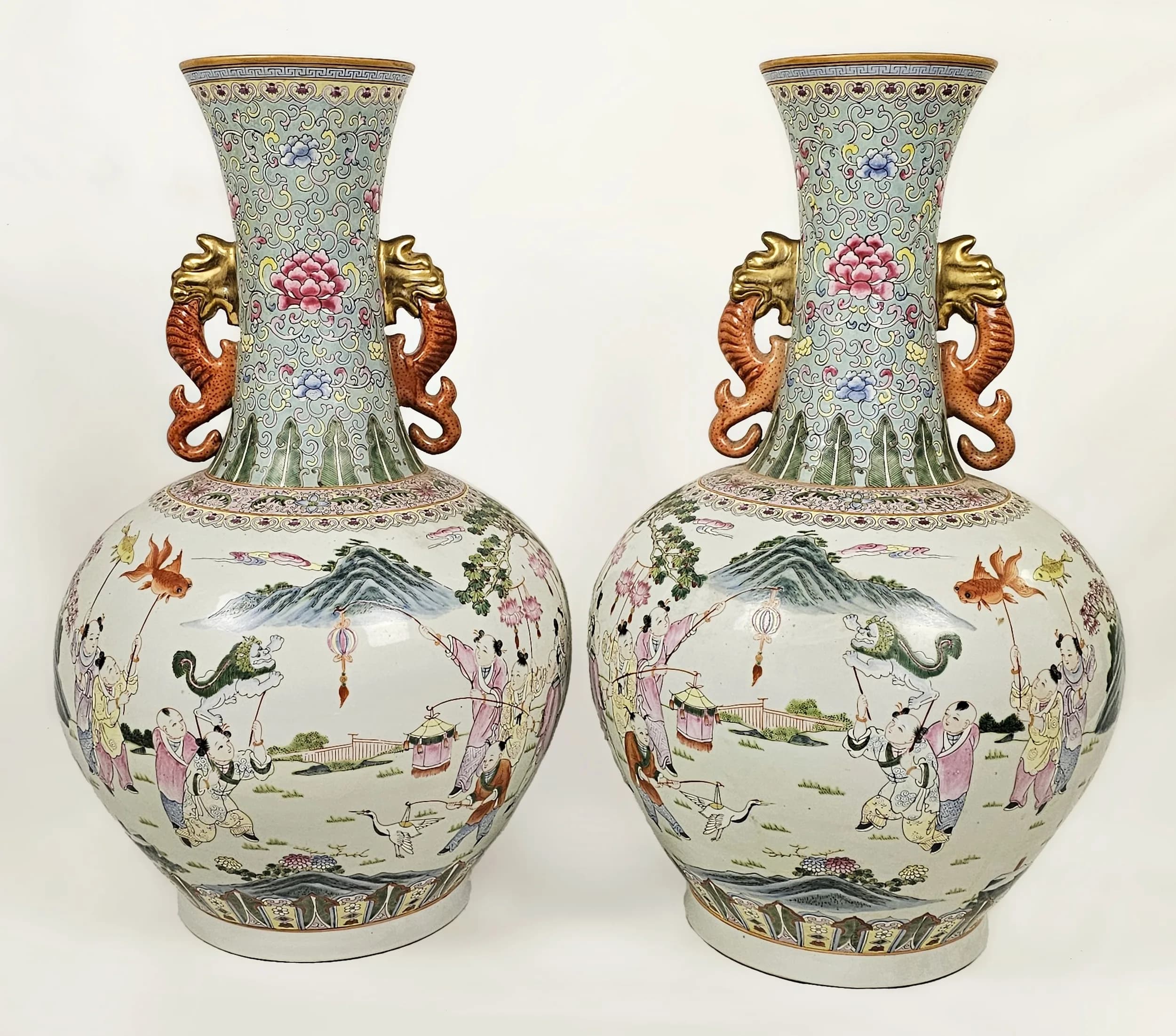 A Large and impressive antique pair of Chinese porcelain vases. Stamped to base. 65 cm high × 34 cm across the middle width.