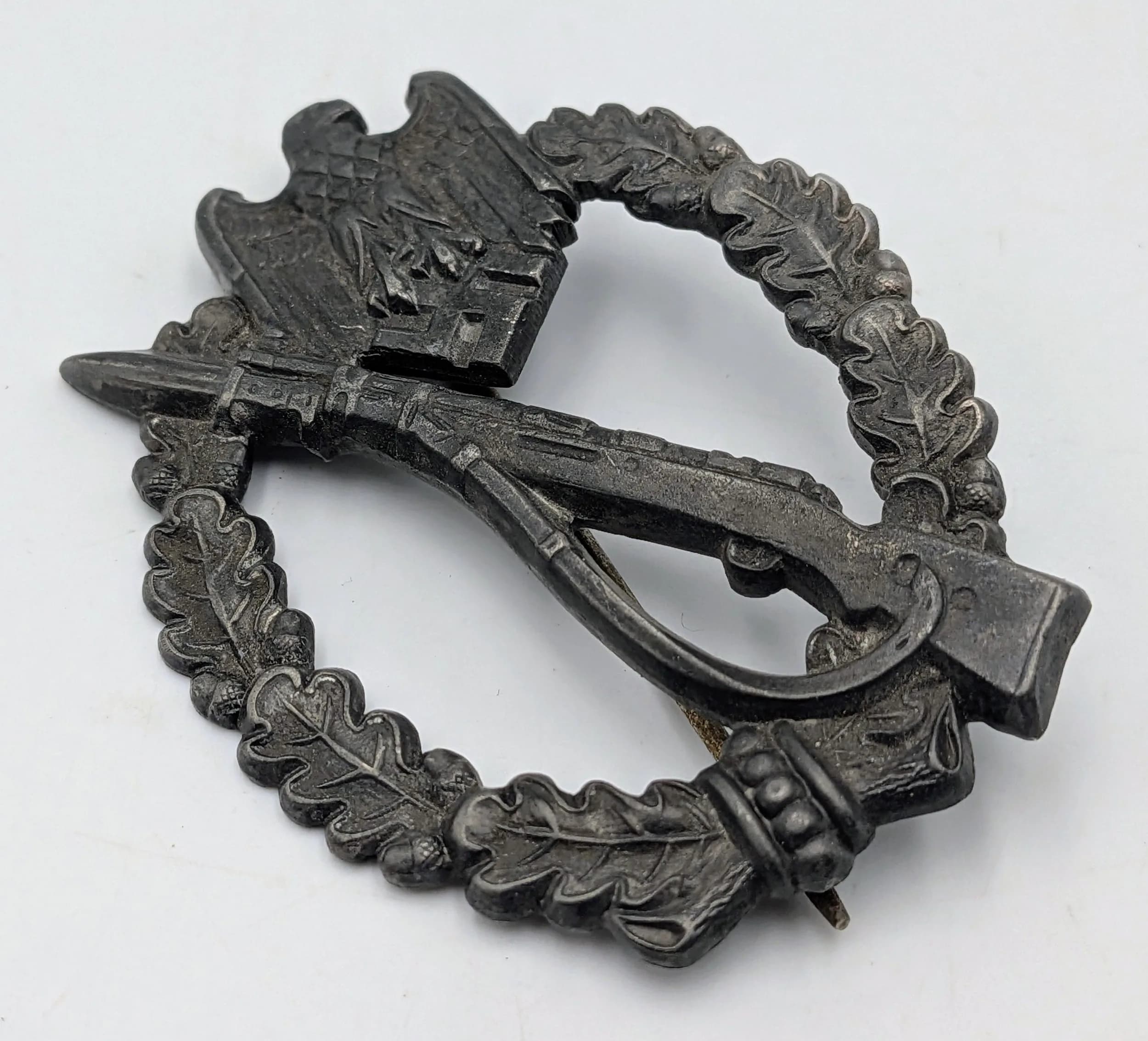 WW2 German Zinc Infantry Assault Badge. Makers Marked GWL for Gebrüder, Wegerhoff. Lüdenschid.