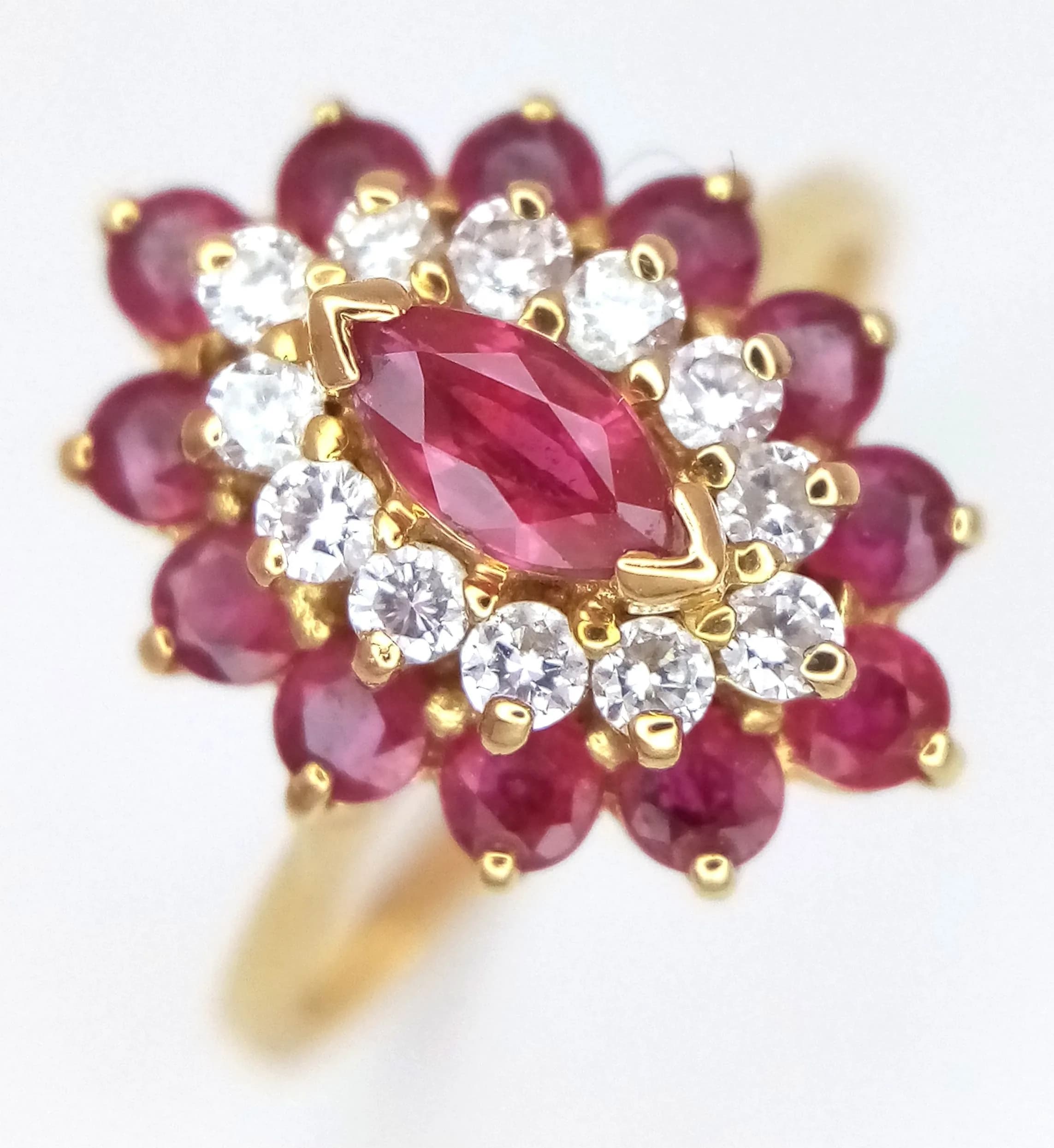 A BEAUTIFUL DIAMOND AND RUBY RING SET IN 18K GOLD . 4gms size O