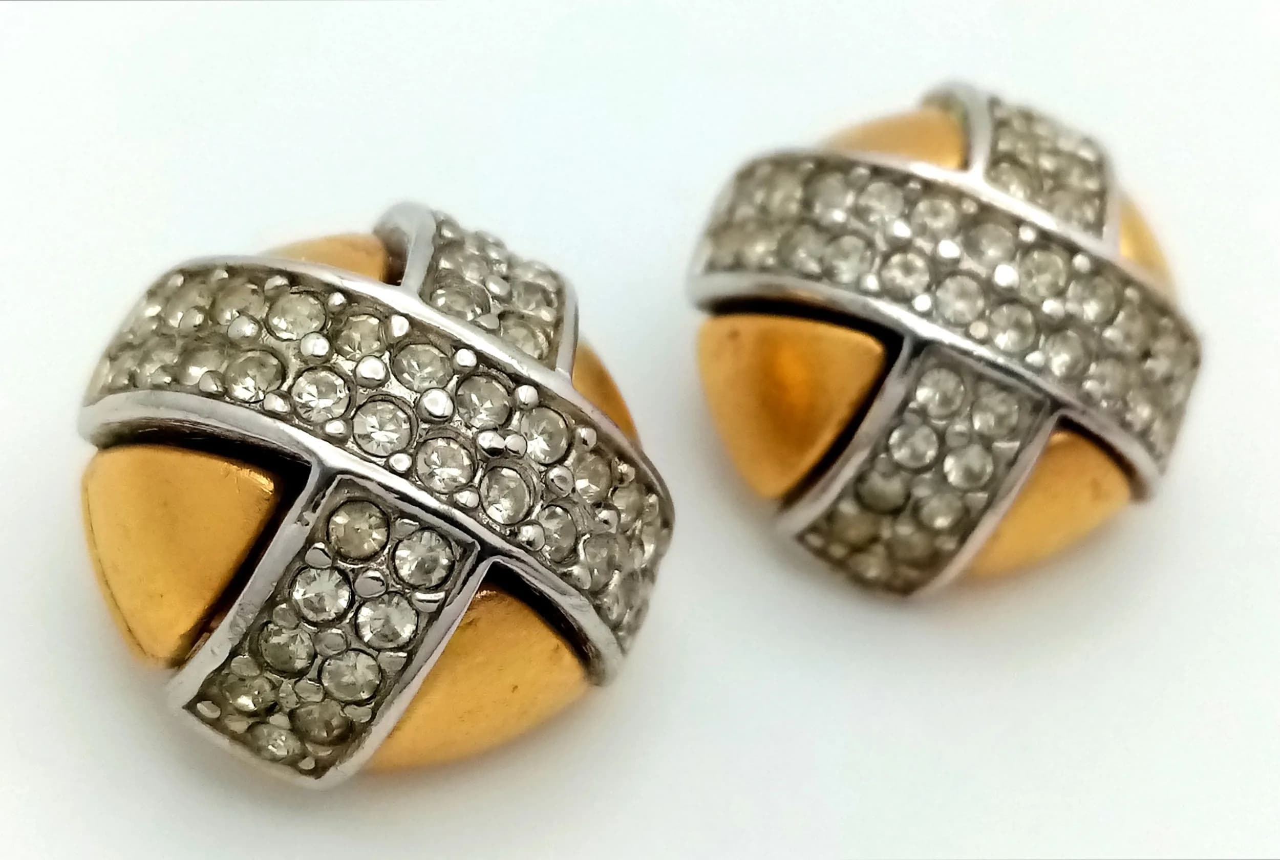 A Pair of Vintage Givenchy Gold-Tone White Stone Set Clip On Earrings. 18mm diameter. In a good condition but please see photos. Ref: 28676