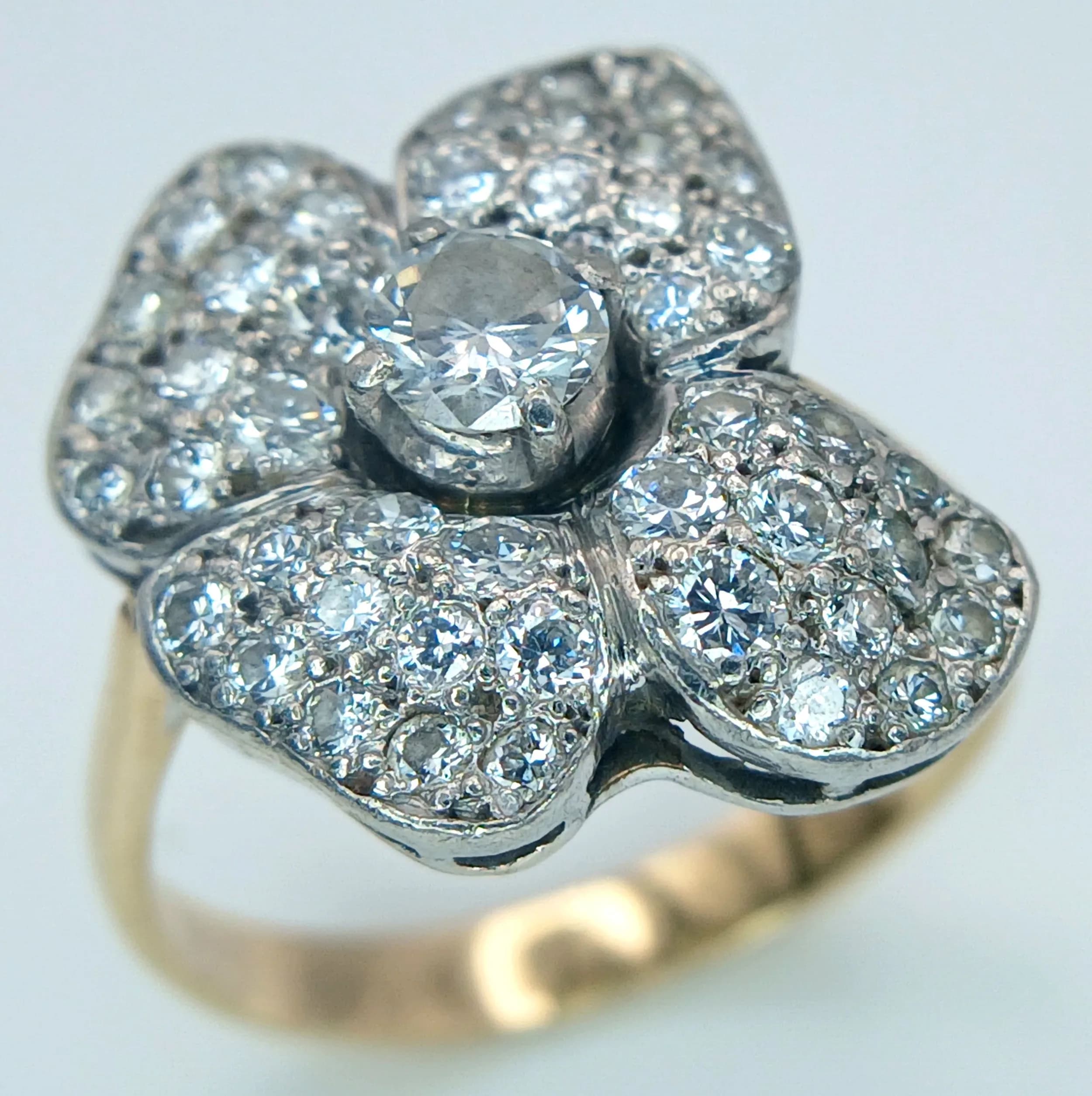 AN 14K YELLOW GOLD, DIAMOND SET, FANCY FLOWER DESIGN RING. 1.50CTW. 5.2G, SIZE M/N. TAN 5003
