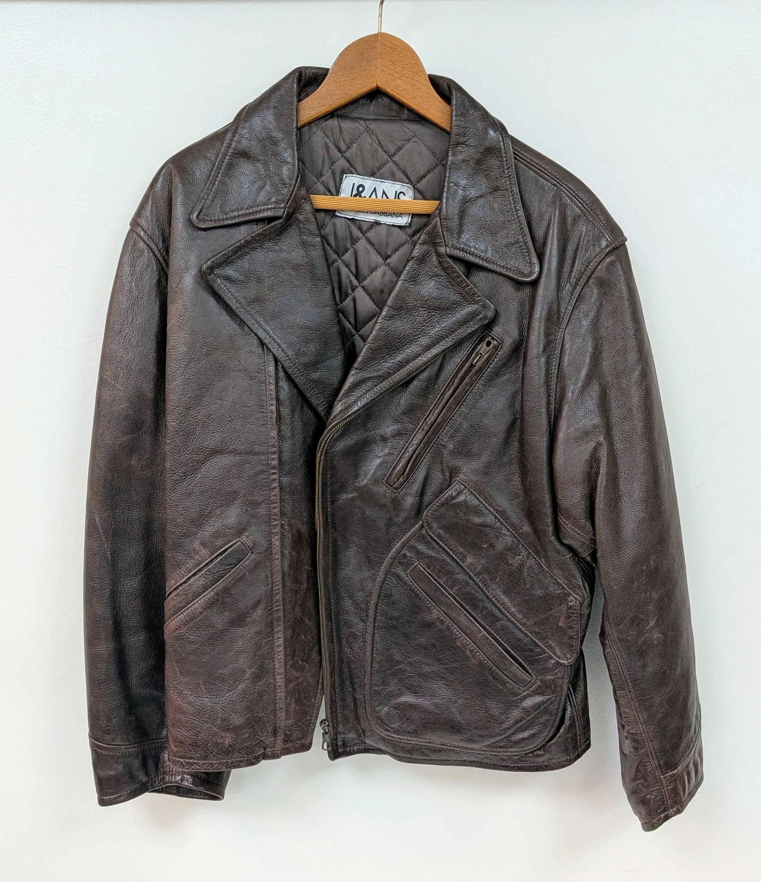 A Vintage Dolce and Gabbana Brown Leather Gents Jacket. J&ANS branding. Large size. Please refer to photos for finer details.