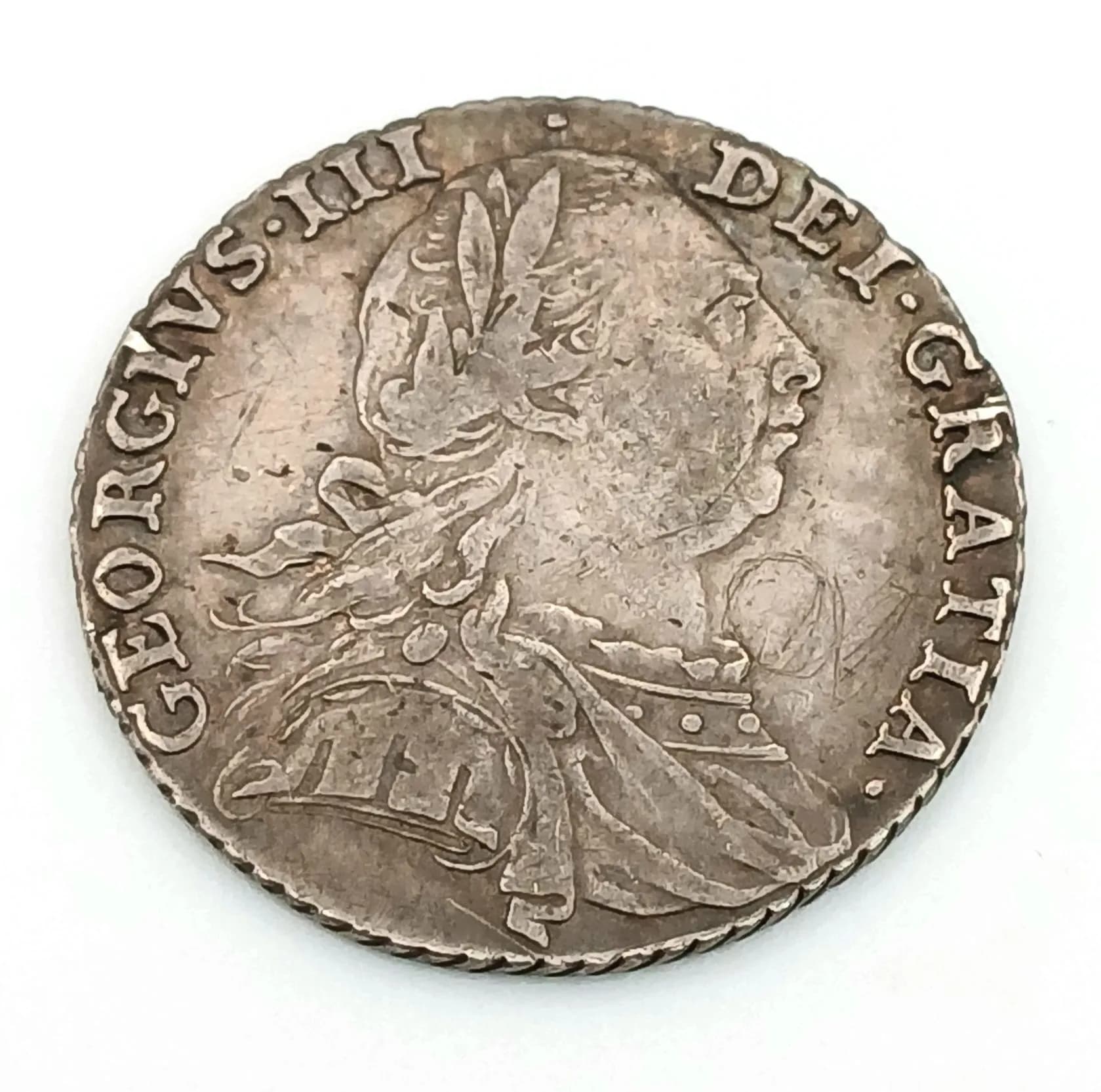 A 1787 George III Silver Shilling Coin.