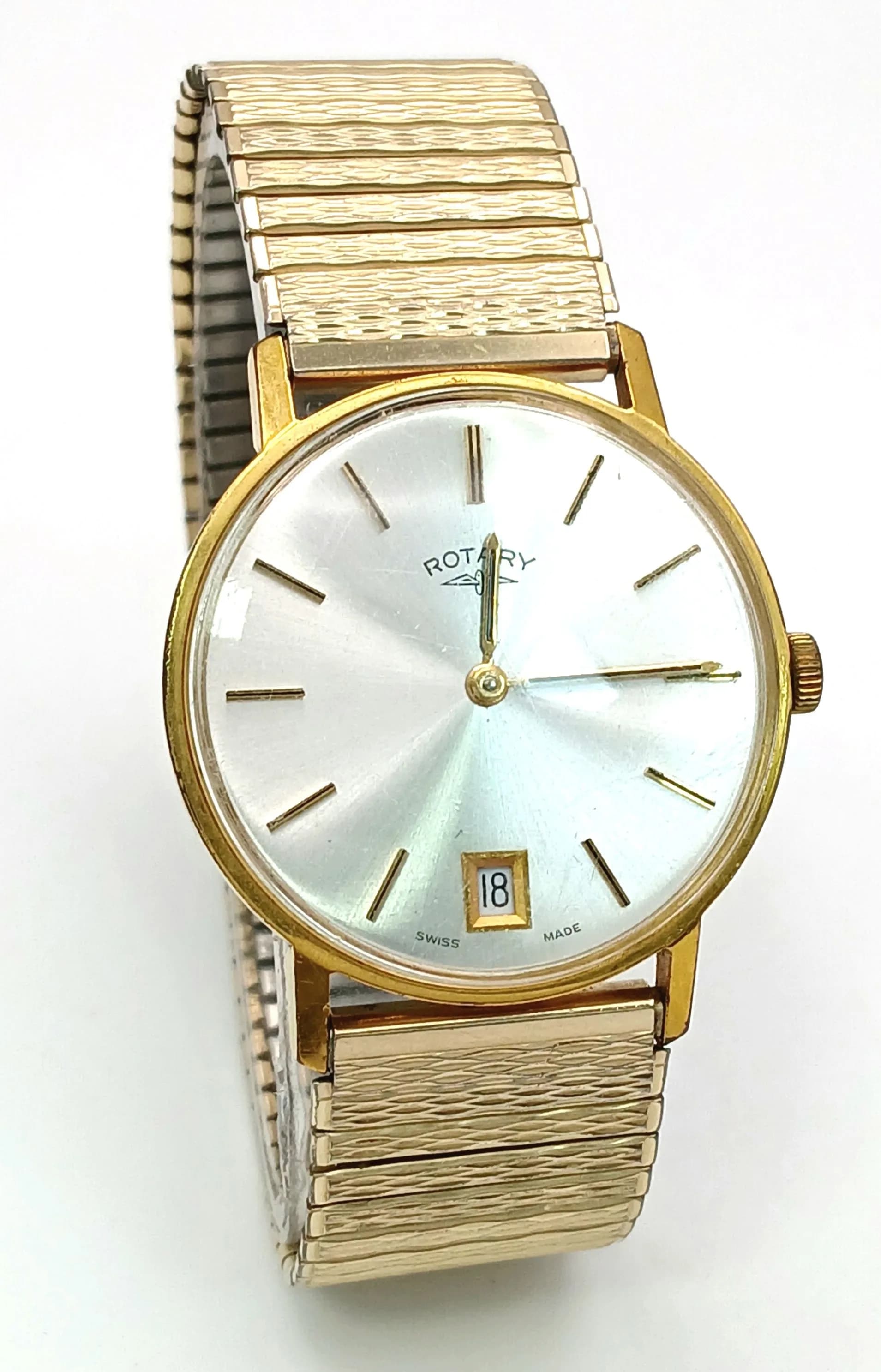 A VINTAGE ROTARY GENTS WATCH IN GREAT CONDITION WITH DATE BOX AND XPANDABLE STRAP, MANUAL WIND PERFECT WORKING ORDER .