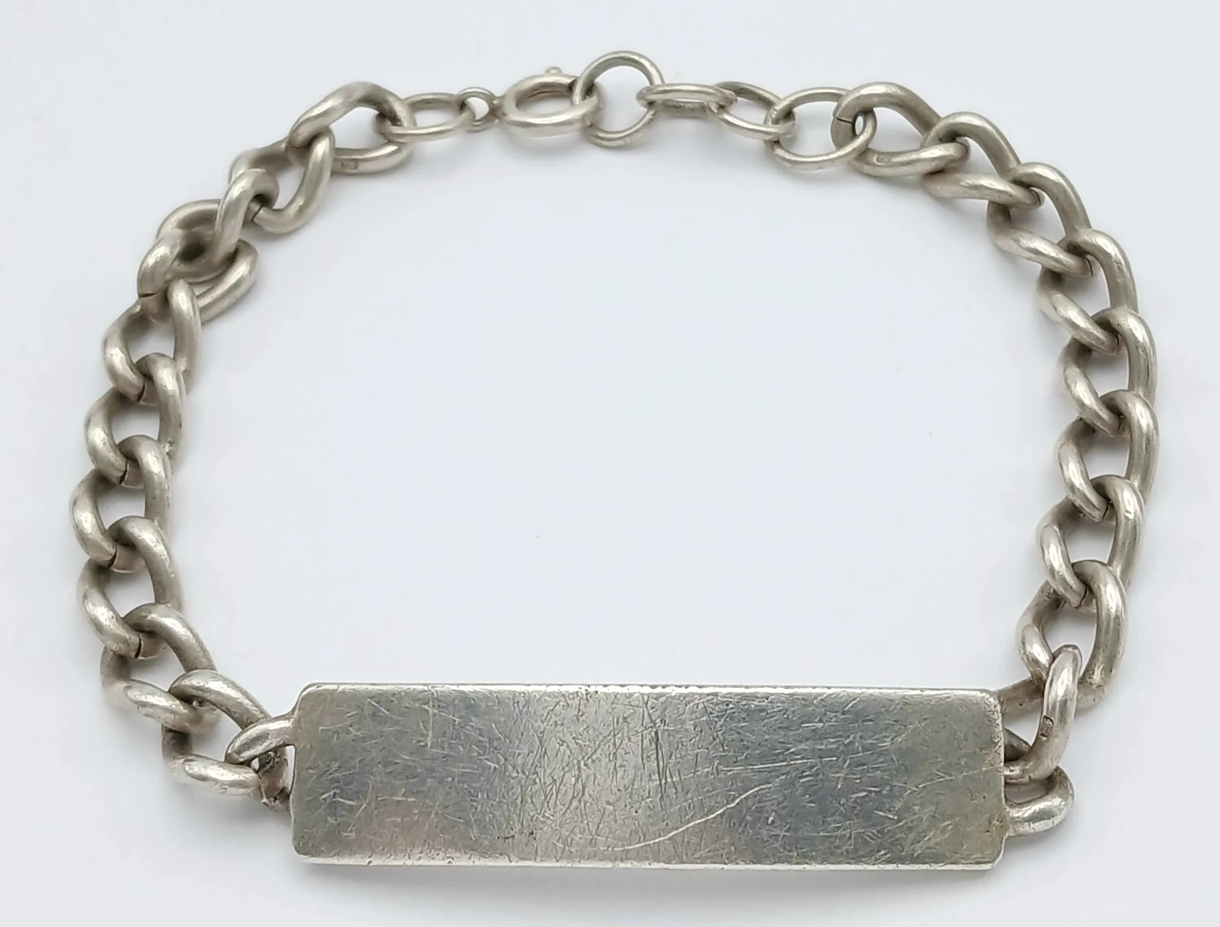 Vintage SILVER IDENTITY BRACELET. Full UK hallmark. Not engraved. 28.0 Grams.20-22 cm.