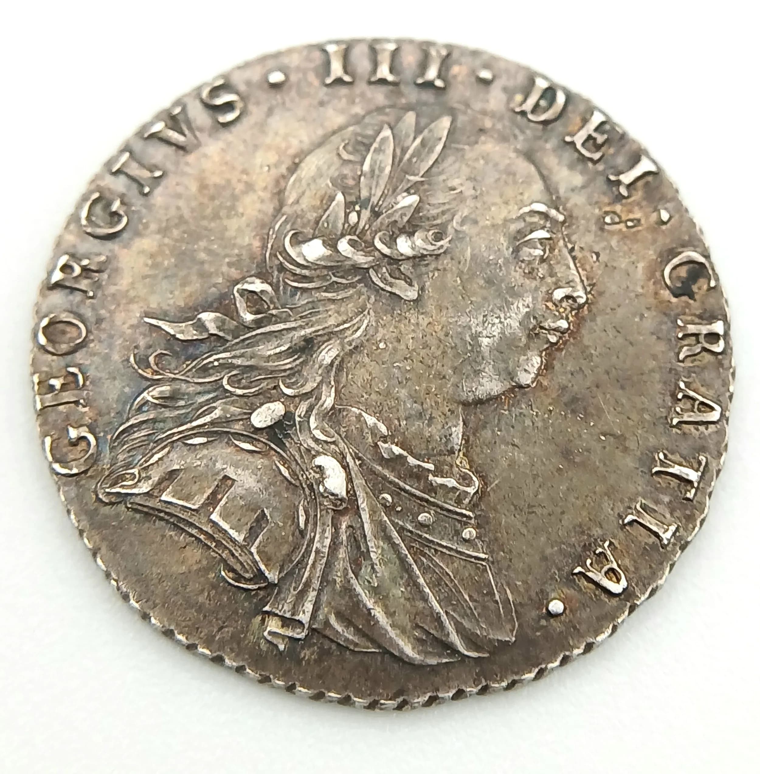 A 1787 George III Silver Sixpence Coin.