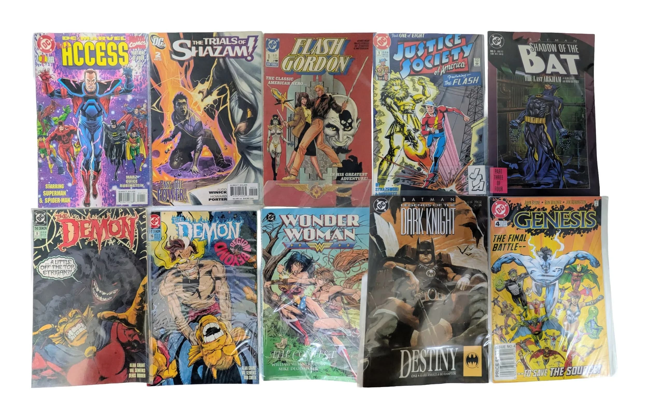 Ten DC Mixed Comics. All plastic wrapped. Please refer to photos for finer details.