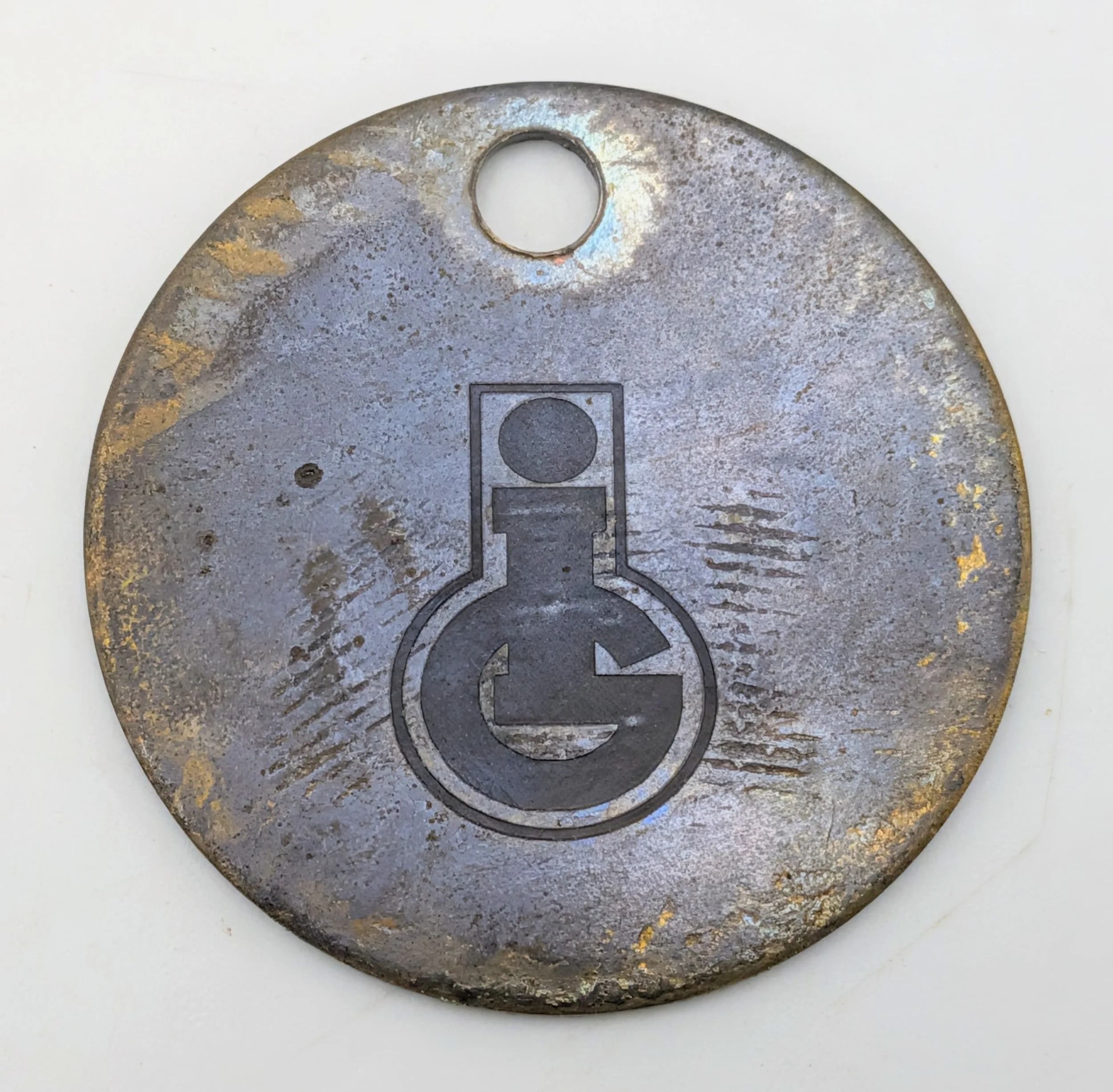 WW2 Tool or Key Token from the German Forced Labour Factory I.G. Farben. The took most of their labour force from Auschwitz and Mauthausen, ironically producing such as Zyklon B gas pellets.