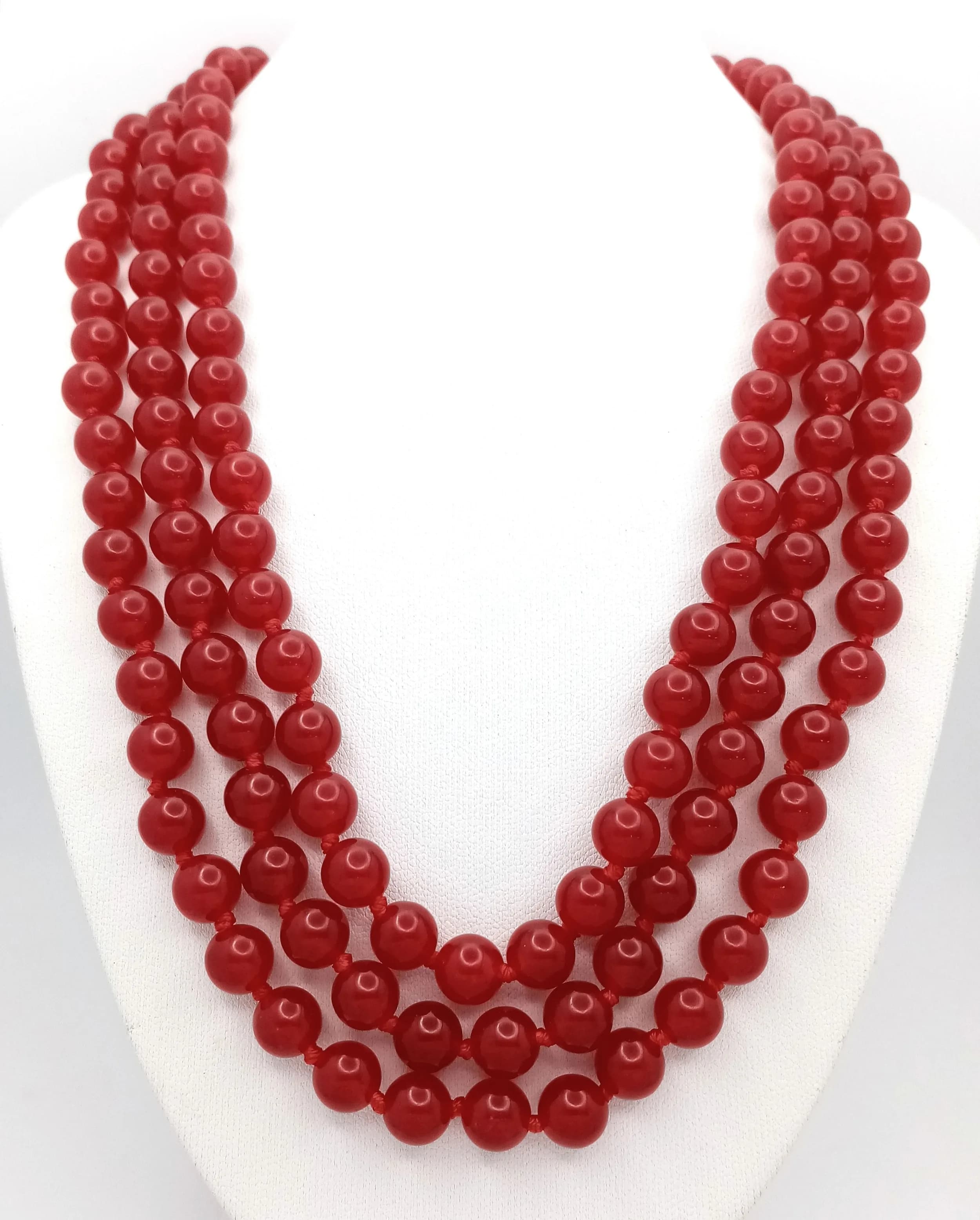 A Three Row Red Jade Beaded Necklace. 8mm jade beads. 42-44cm.