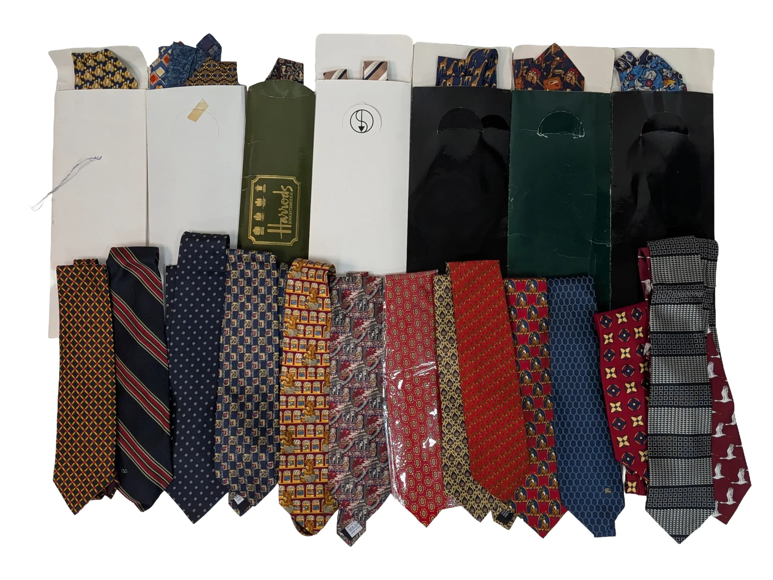 23 Designer Silk Ties. Some in original packaging. All in good condition. Includes: YSL, Givenchy, Valentino, Burberry.