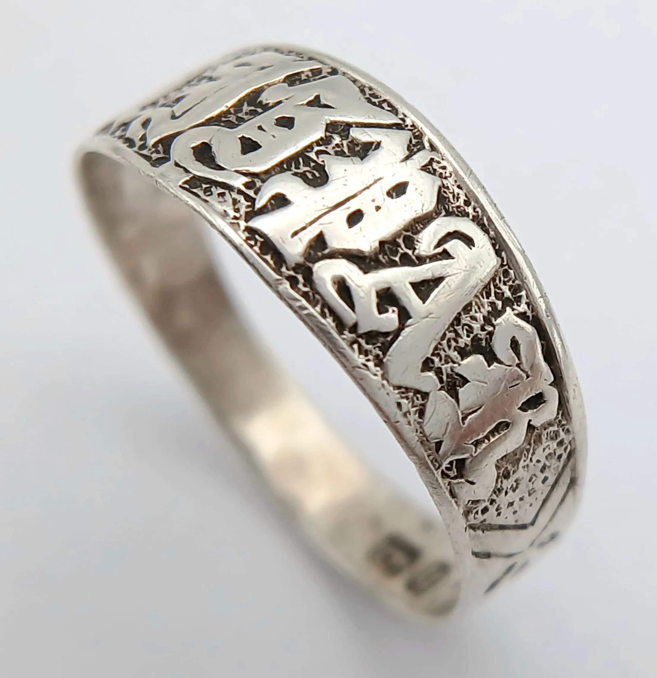 An Antique, Hallmark Date 1894, Silver ‘Mispah’ Ring. Size P. The Ring measures 8mm Wide at the Crown and weighs 1.32 grams.