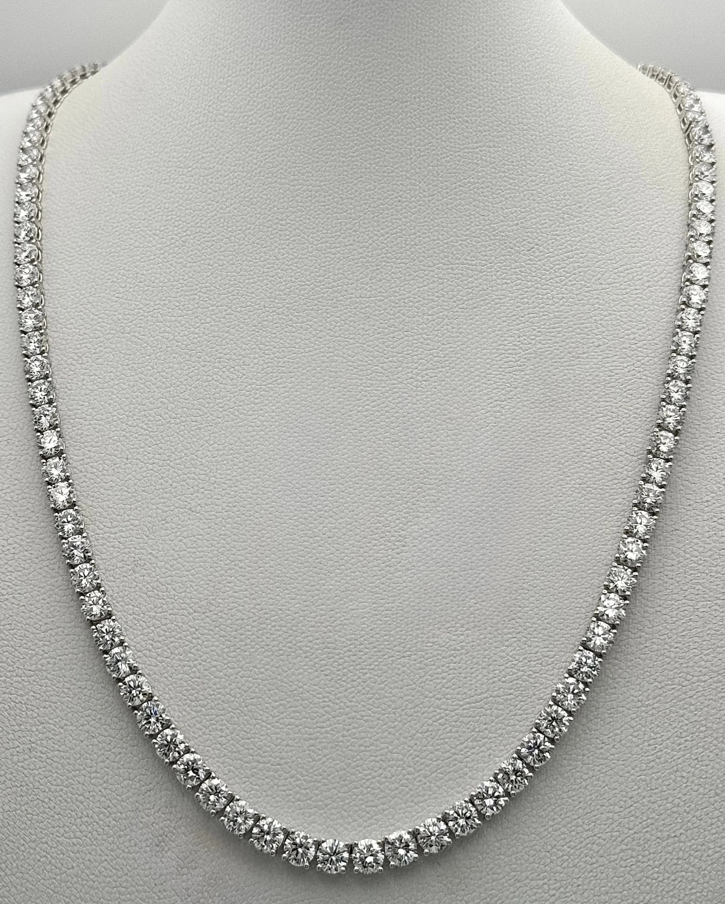 A W.G.I Certified 10K White Gold, Diamond Tennis Necklace. Set with 114 round brilliant lab grown diamonds - 22.16ctw. E-F colour with VVS-VS clarity. 44cm length. 16.41g total weight. Ref: 62999D.