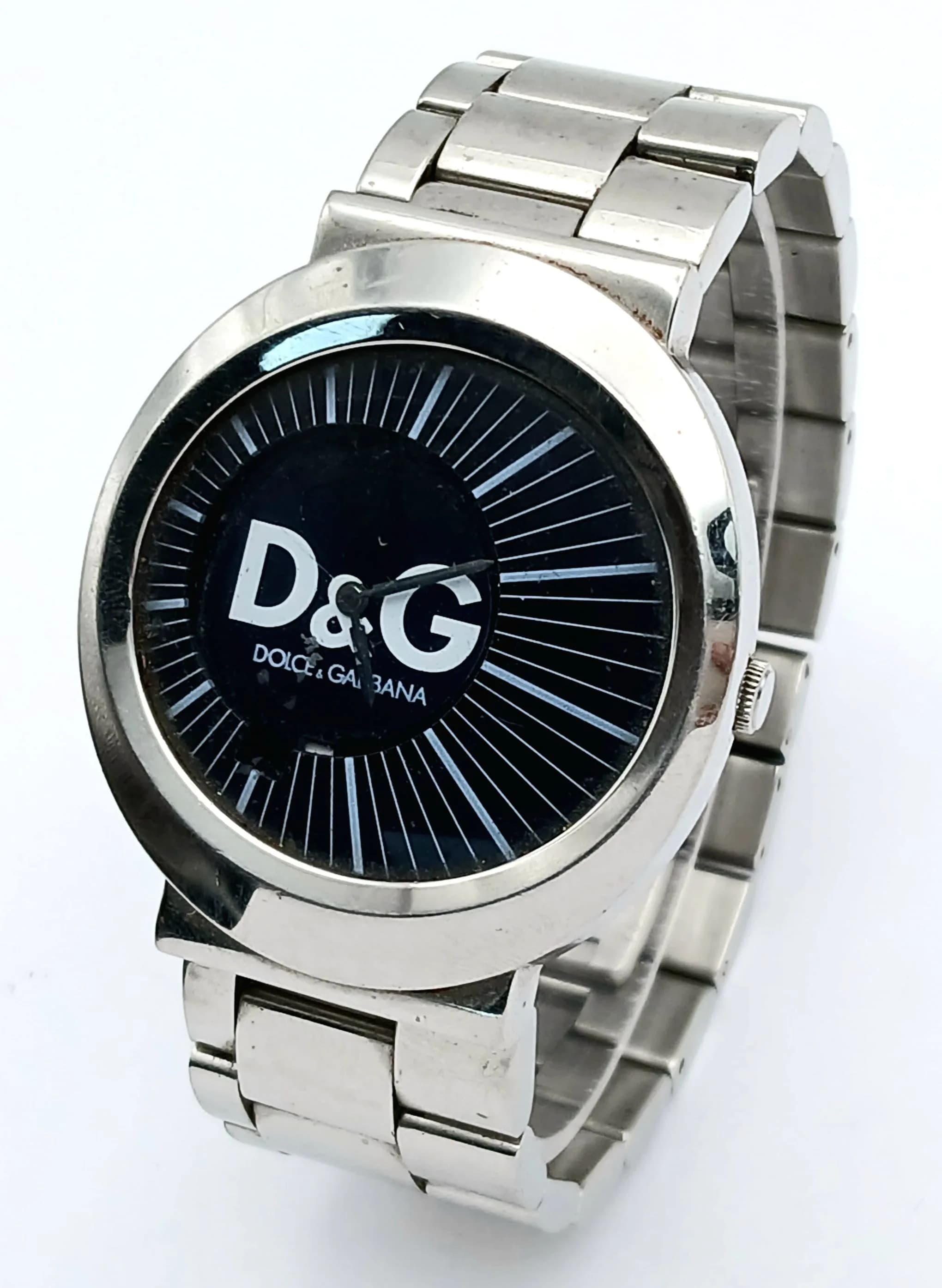 A DOLCE AND GABBANA, STEEL BRACELET WATCH. IN FULL WORKING ORDER. NEW BATTERY FITTED RECENTLY. S/A 1693 - 1