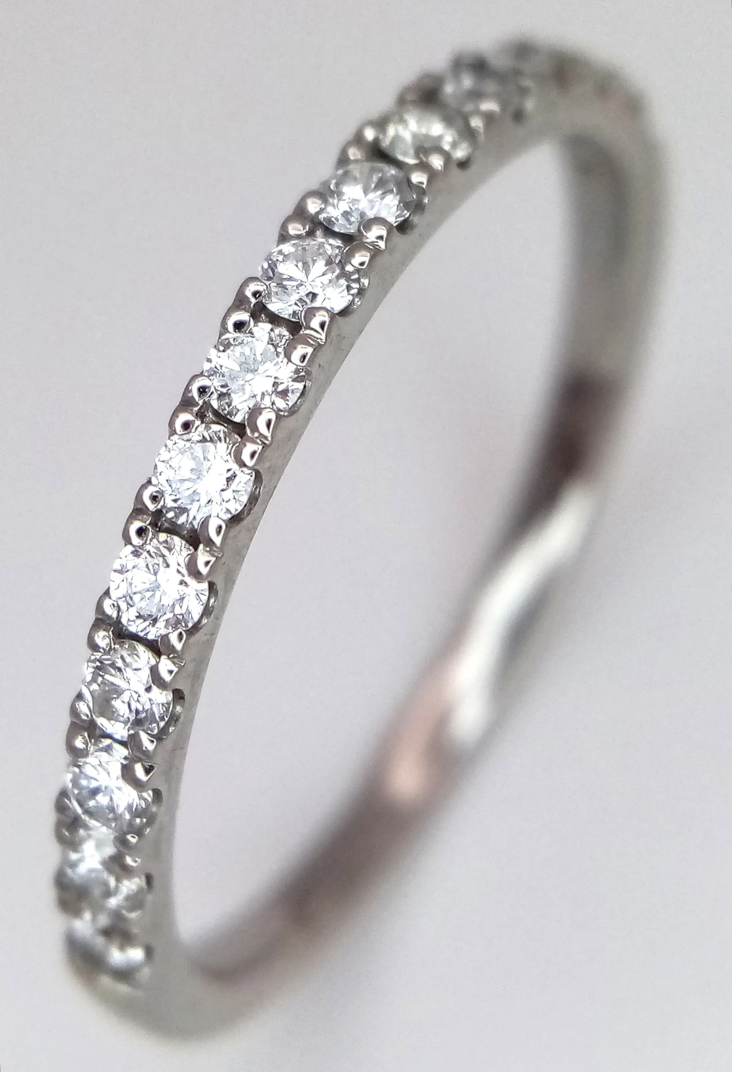 A Platinum, Diamond Set, Half Eternity Ring. 0.60Ctw. 4G, Size X. Az 3001