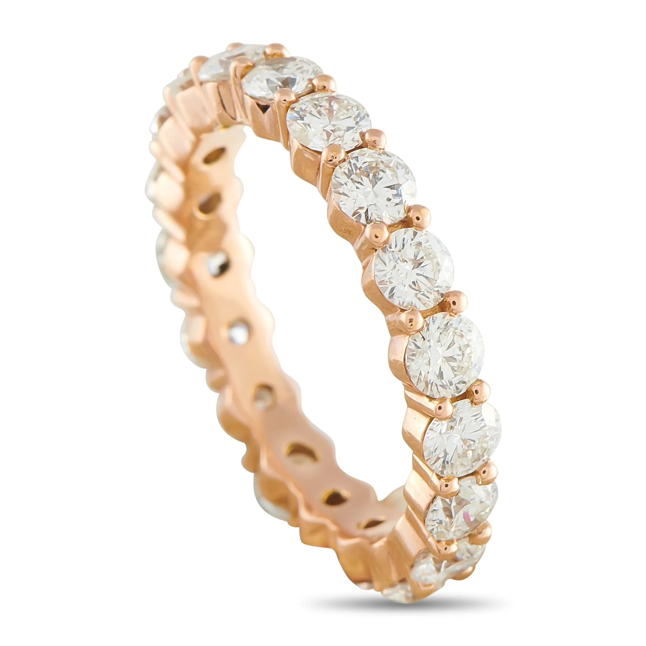 A 14K Rose Gold 4.40ct Diamond Eternity Band Ring. The 14K Rose Gold band features round-cut diamonds with a total weight of 4.40 carats. It features a 4 mm-wide band and a top height of 3 mm. This jewellery piece is offered in good condition and includes a gift box. Ring size: 10 (UK size T). Total weight: 5.6 grams. *This item is held at Cadmore USA Office in Pennsylvania, USA and will be shipped from there. Buyers will be responsible for direct shipping payments.*