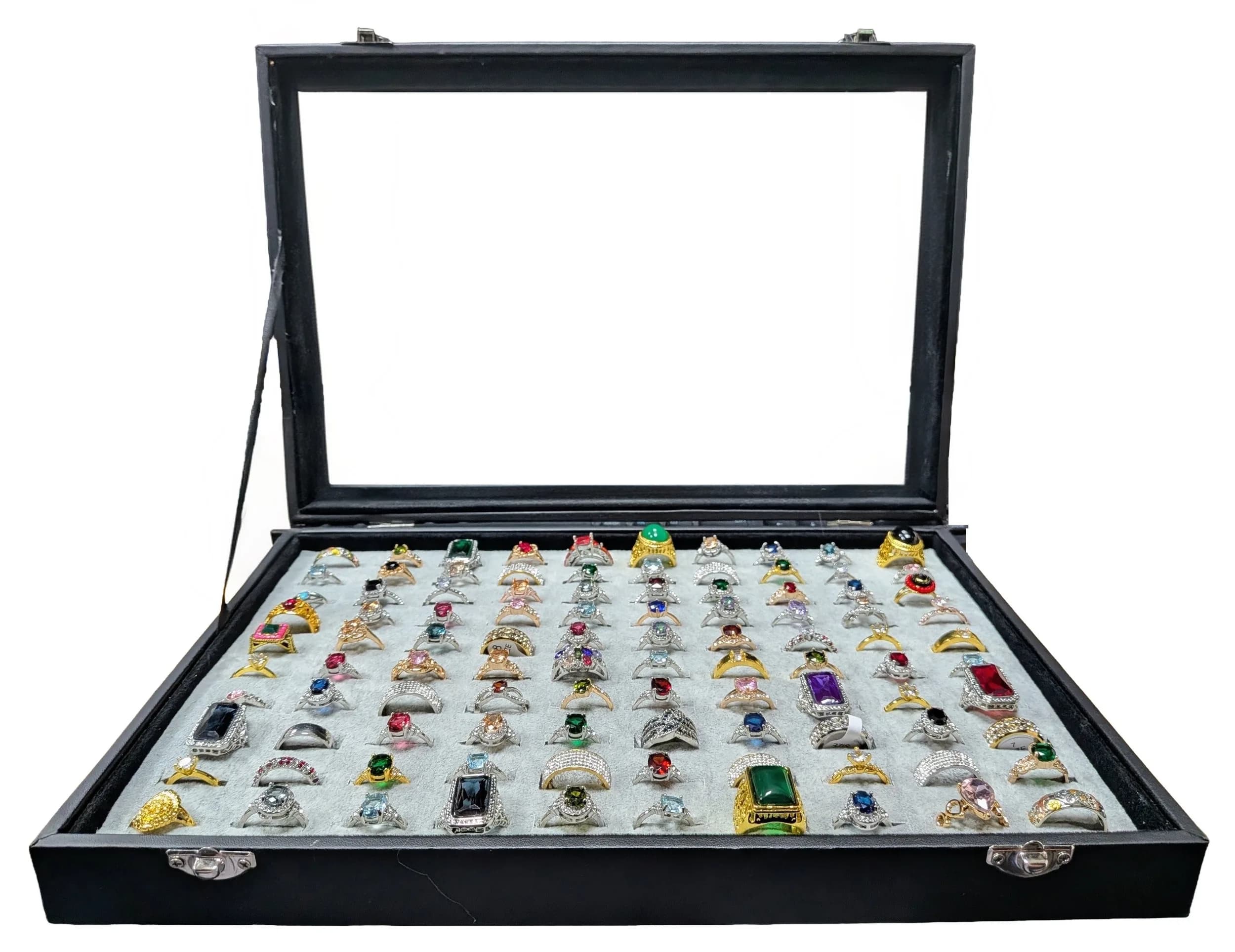 A Jewellery Display Case with 100 Rings! An absolutely fabulous lot with different colored set stones to acrylic/resin decoration. All types of stone cuts with gilded and white metal shanks of different design. Sizes range from small to large. All rings in excellent condition. Case size - 35 x 24cm