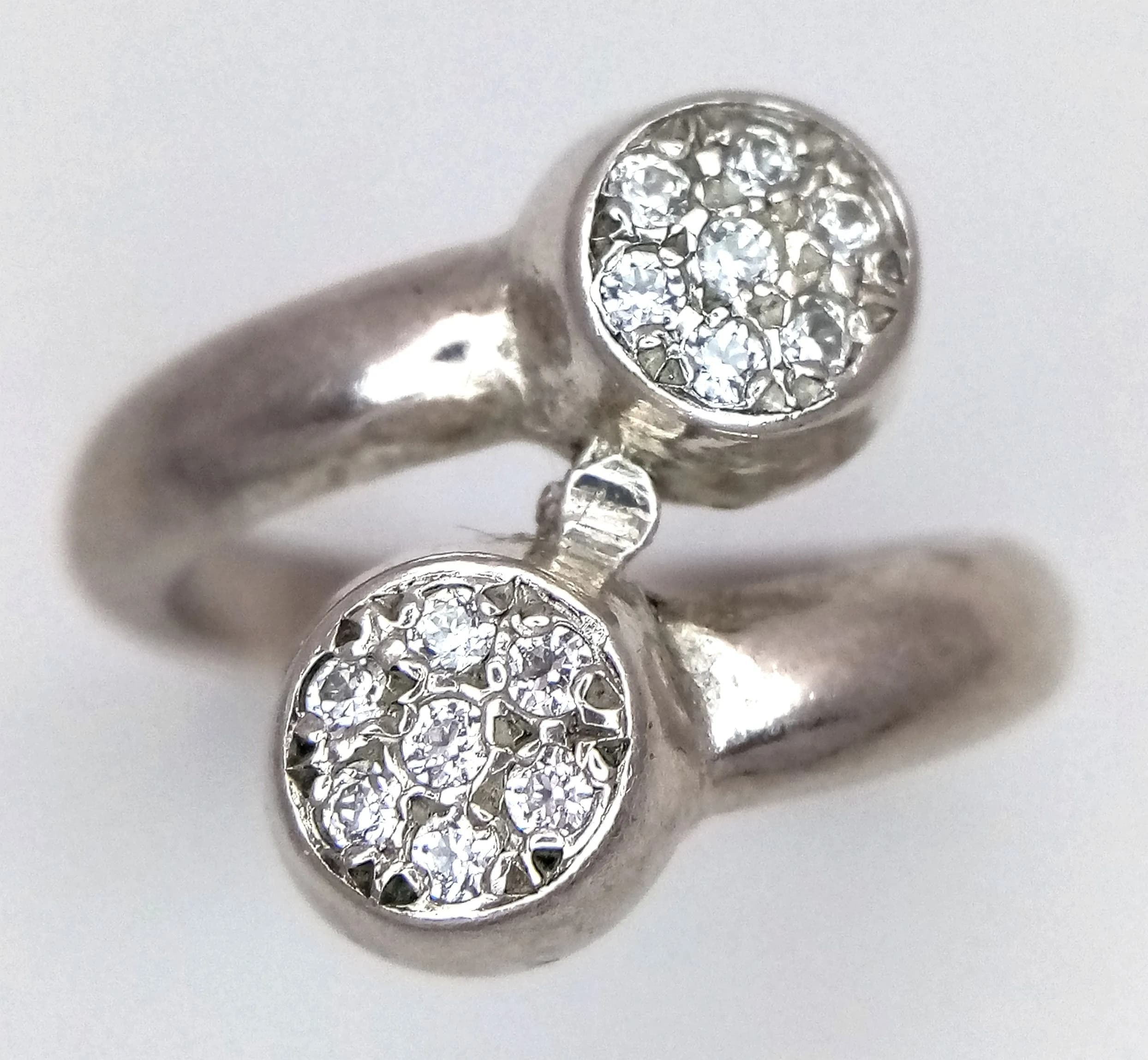 Impressive CHUNKY SOLID SILVER CROSSOVER RING with ZIRCONIA CLUSTER FINIALS. Absolutely stunning, please see pictures. Size N 1/2. Good