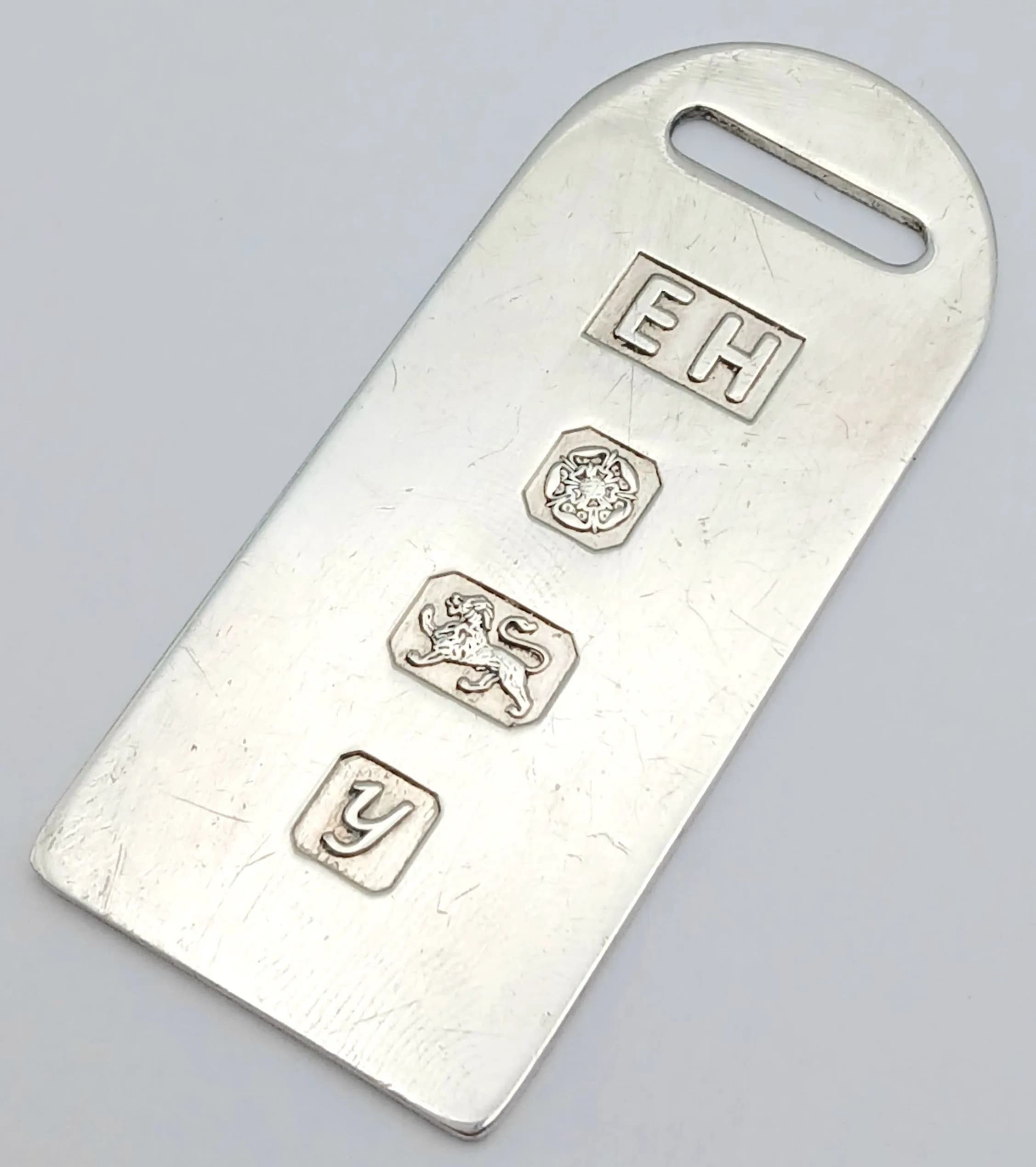 A Vintage Sterling Silver Ingot Pendant. 1998 Sheffield hallmarked, maker’s mark E.H. Approx 5cm x 2.5cm. Total weight 13 grams.