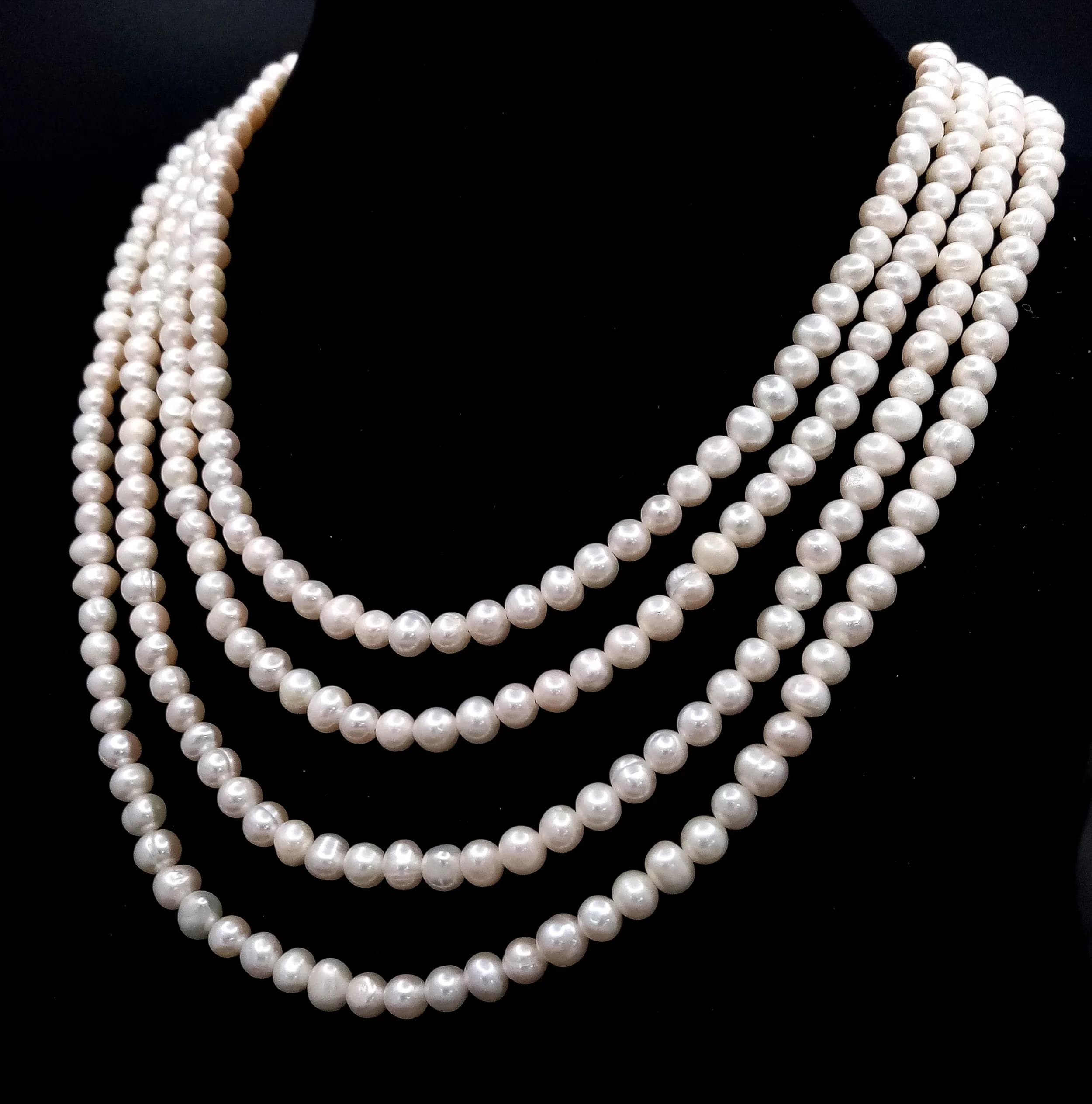 An impressive opera rope length Freshwater Pearl Necklace. Approx 239cm in length. Please see photos for details.
