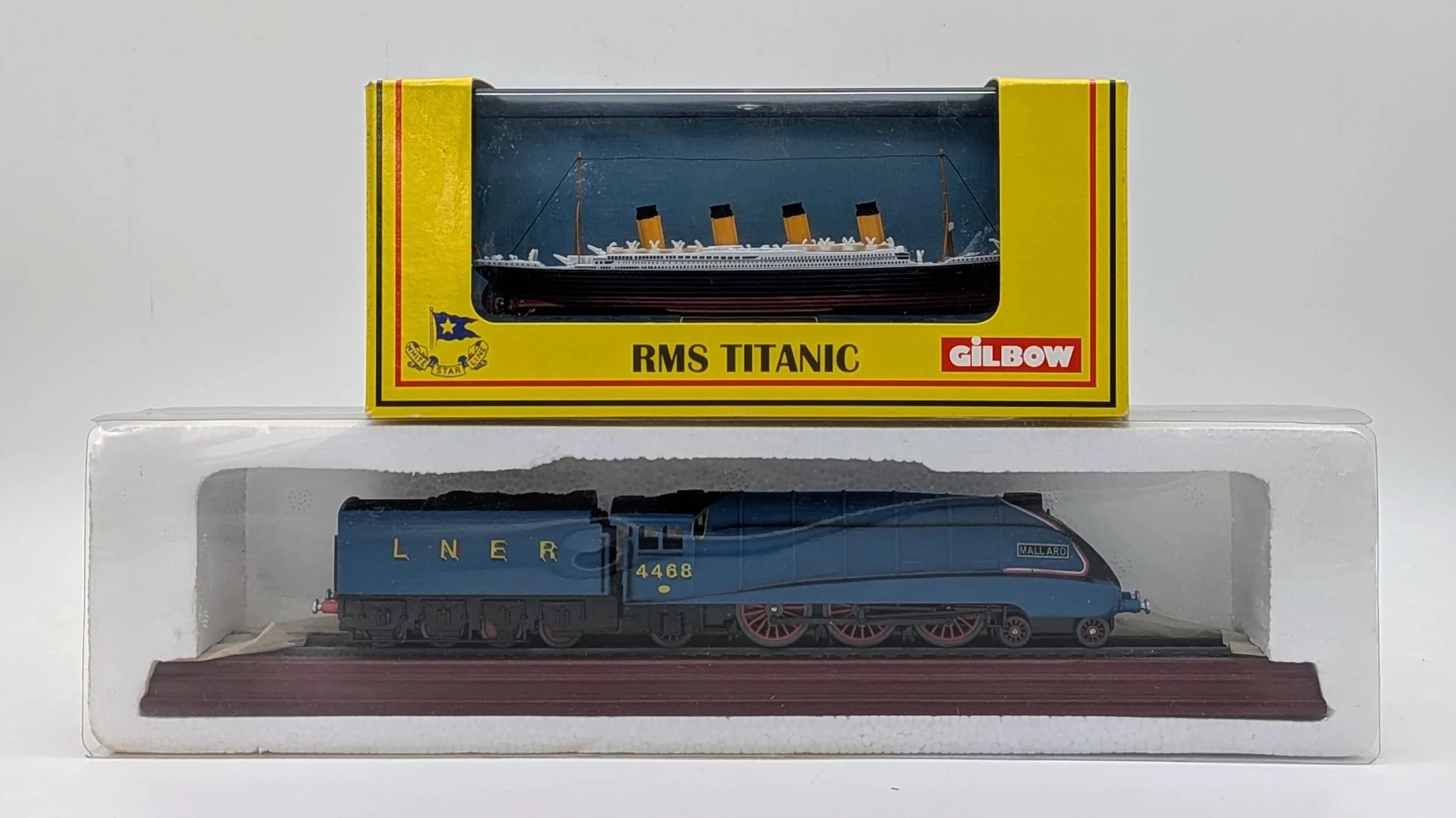 Two die cast model. The Titanic & The Mallard. Two great pieces of great British engineering. Good condition.